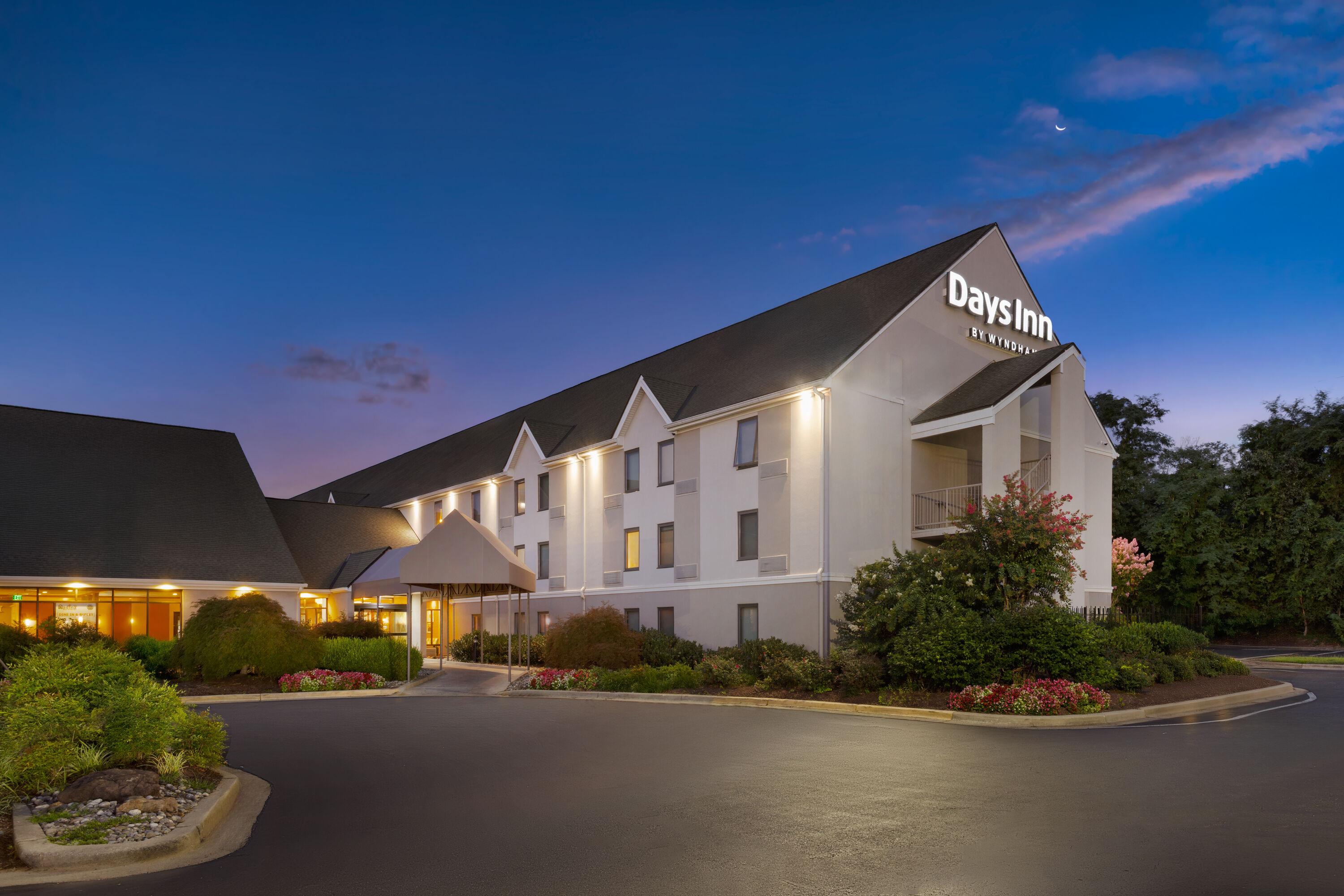 Exterior Dusk Image of Days Inn by Wyndham Lanham Washington DC hotel in Lanham, Maryland
