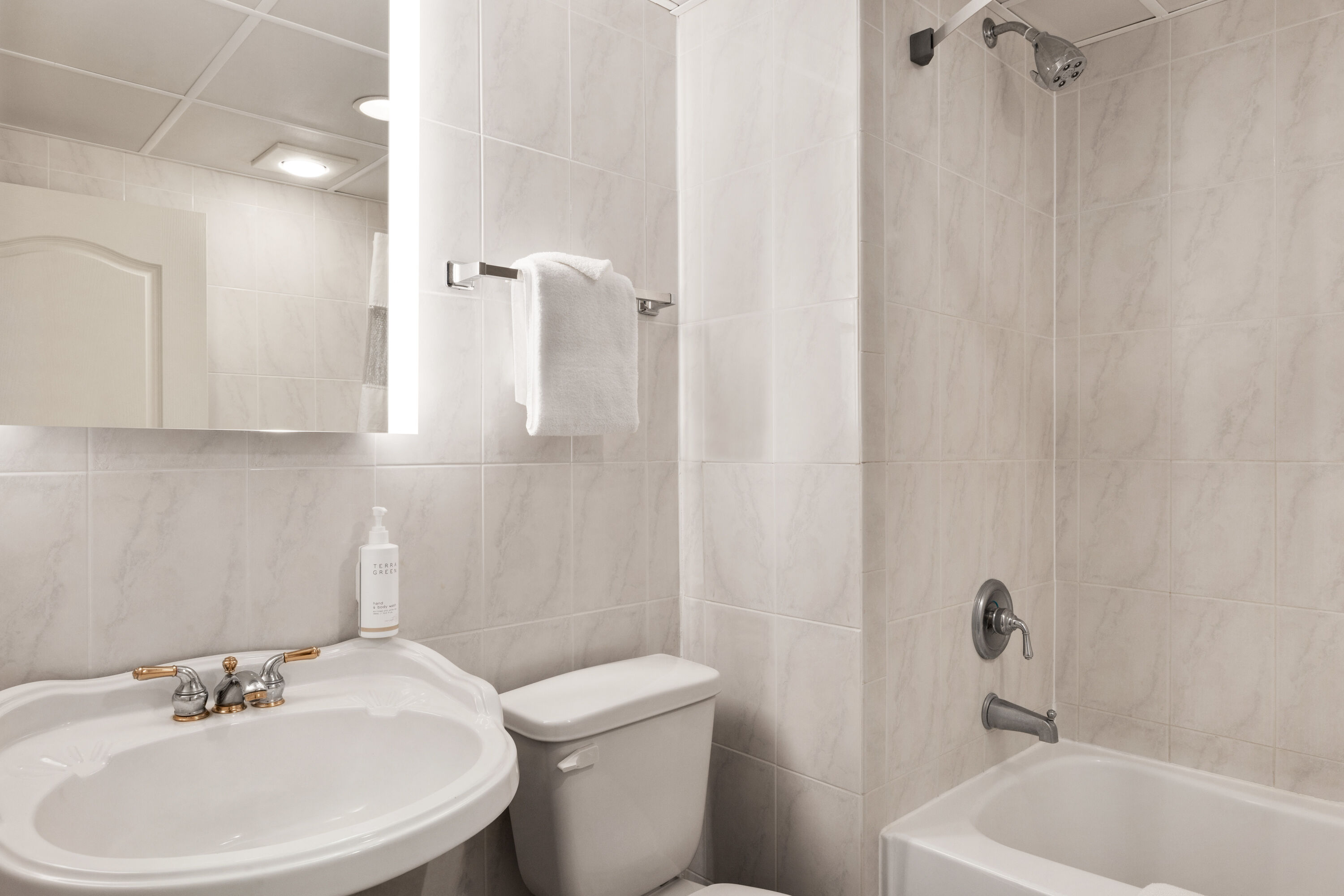 Guest room bath at the Days Inn by Wyndham Ocean City Oceanfront in Ocean City, Maryland