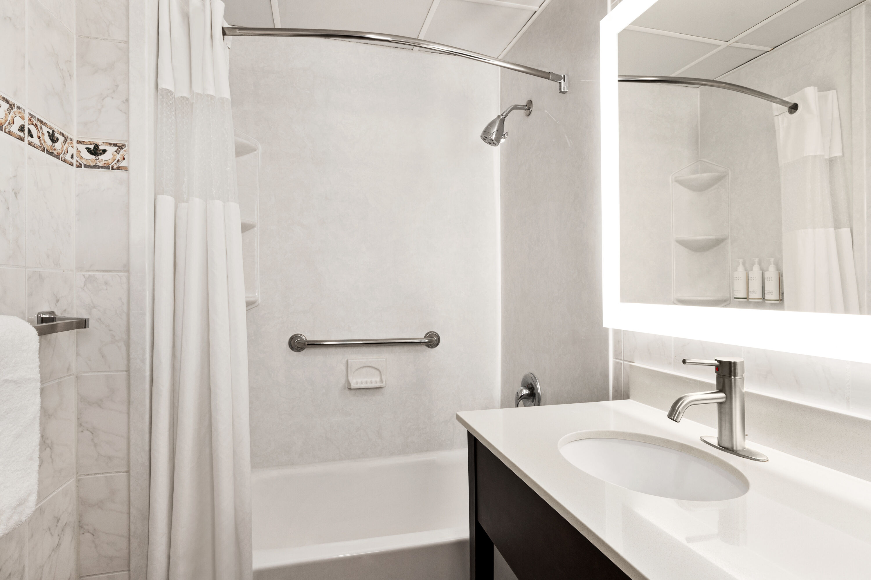 Guest room bath at the Days Inn by Wyndham Ocean City Oceanfront in Ocean City, Maryland