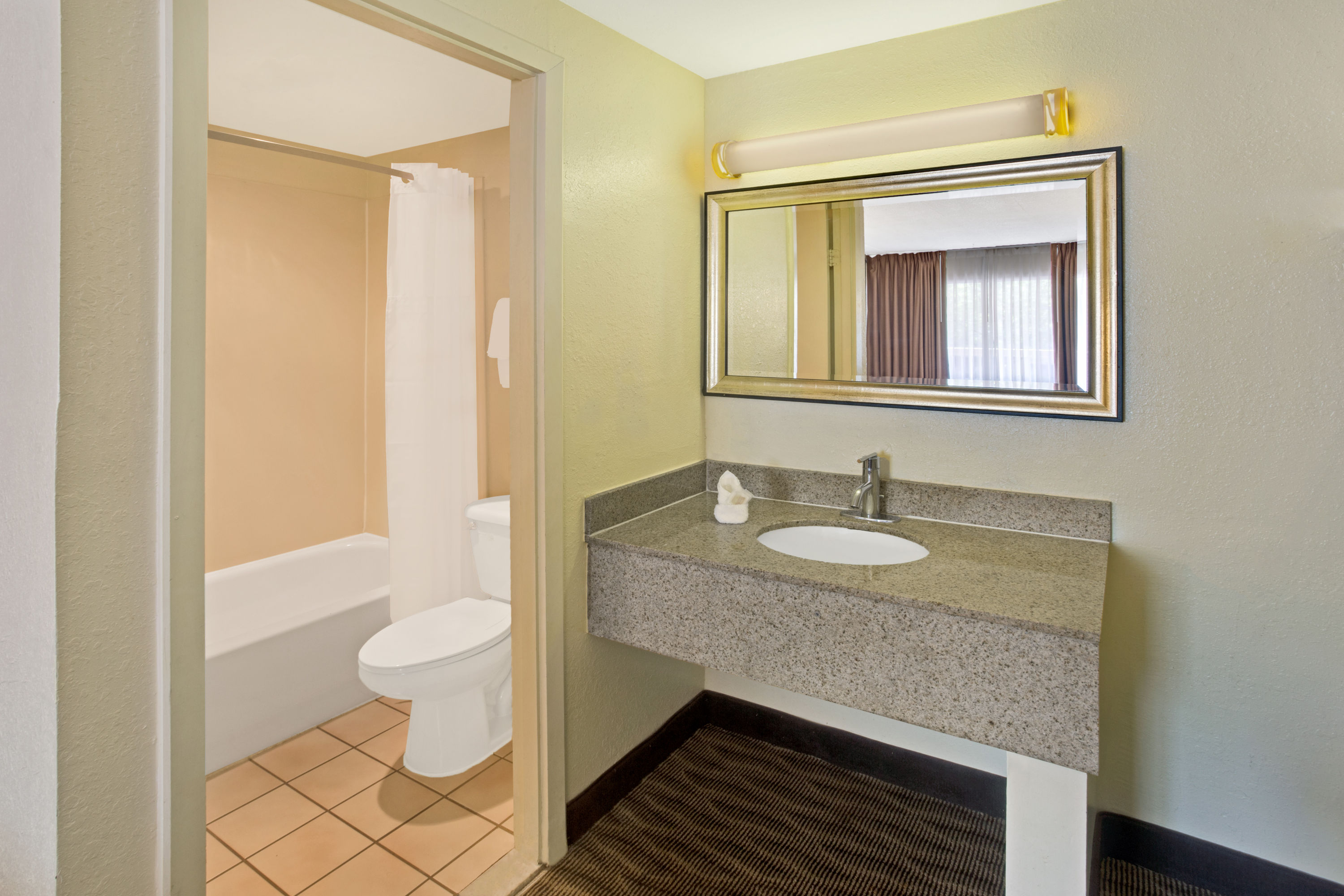 Guest room at the Days Inn by Wyndham Silver Spring in Silver Spring, Maryland