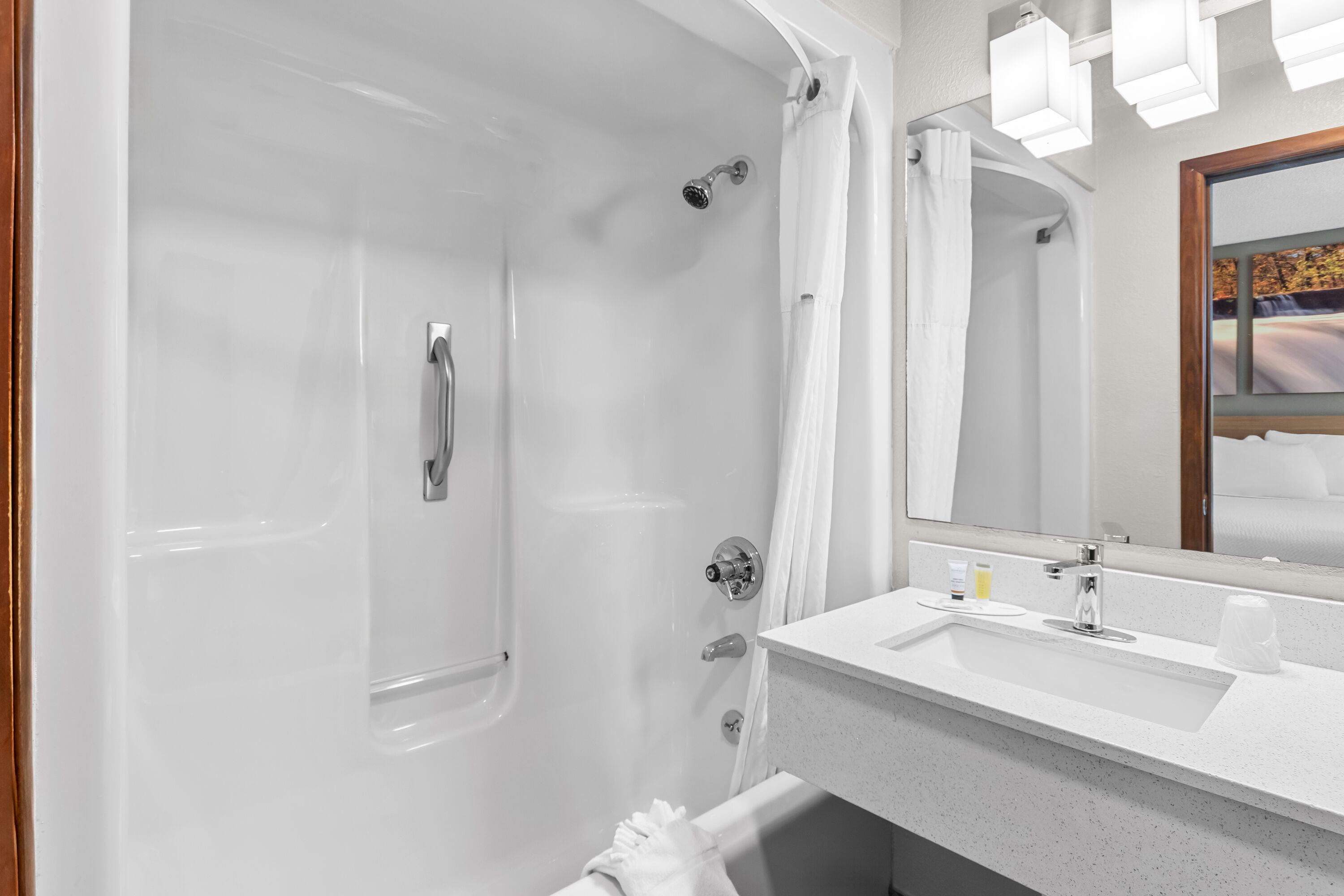 Guest room bath at the Days Inn by Wyndham Alpena in Alpena, Michigan