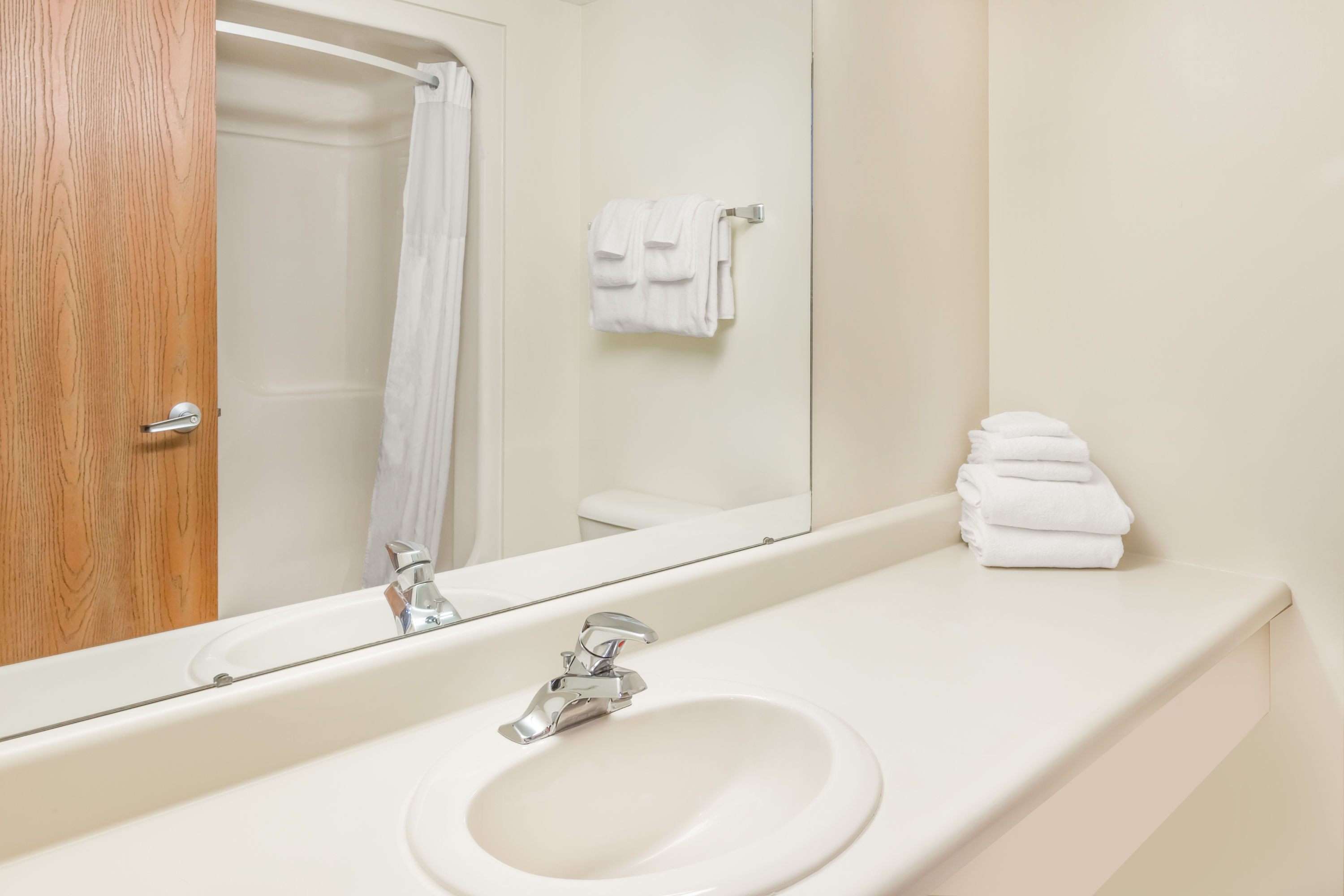 Guest room bath at the Days Inn by Wyndham Alpena in Alpena, Michigan