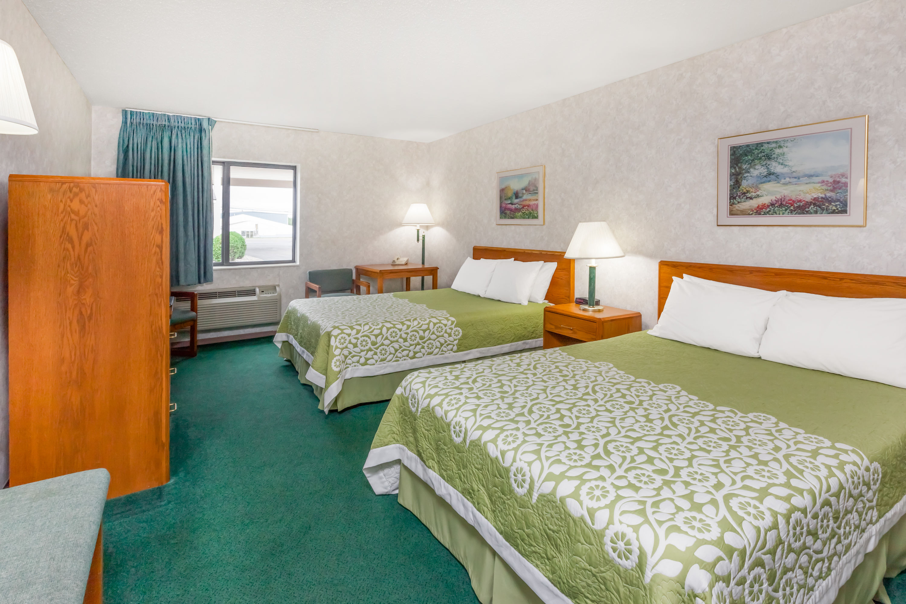 Guest room at the Days Inn by Wyndham Alpena in Alpena, Michigan