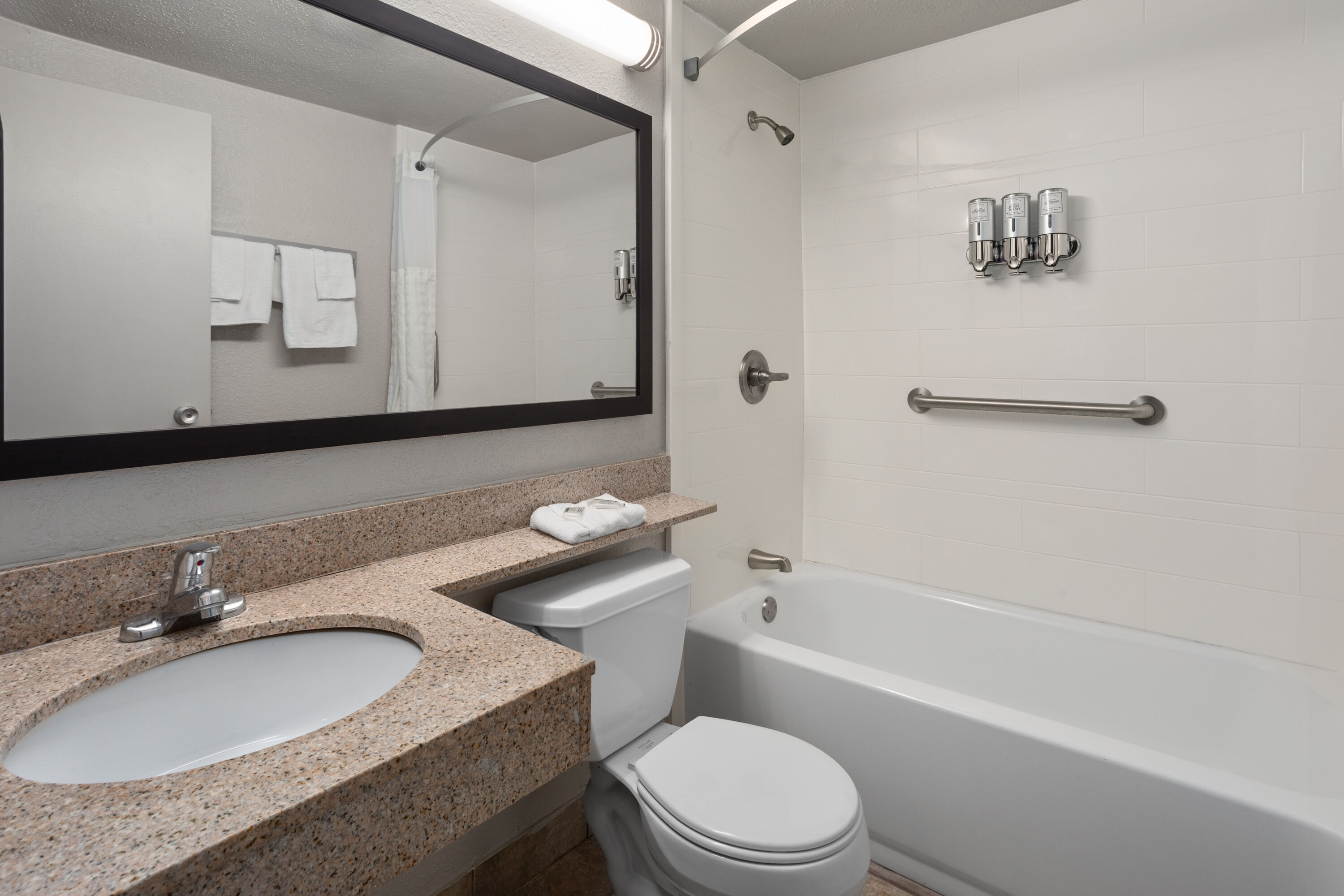 Guest room bath at the Days Inn by Wyndham Ann Arbor in Ann Arbor, Michigan