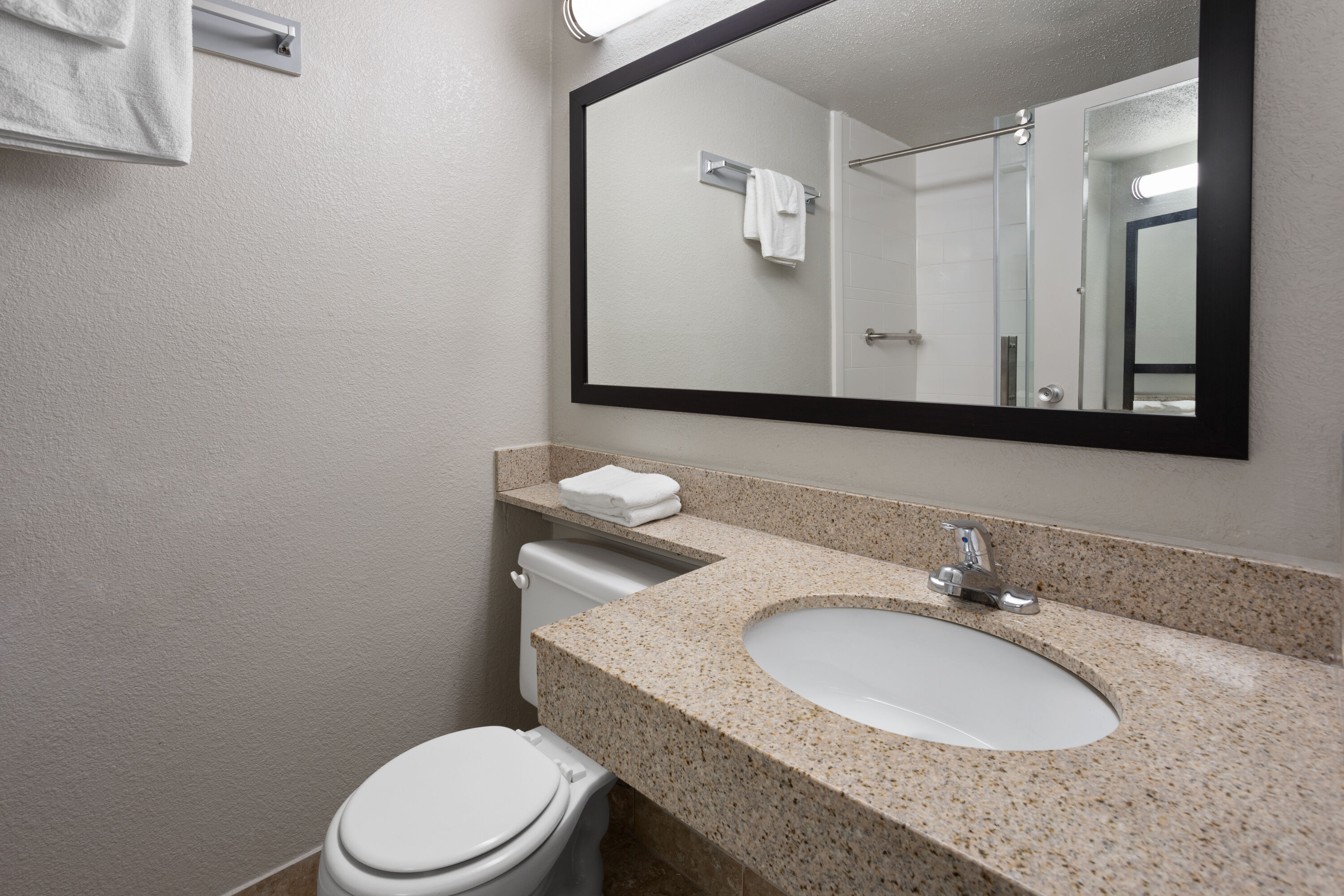 Guest room bath at the Days Inn by Wyndham Ann Arbor in Ann Arbor, Michigan