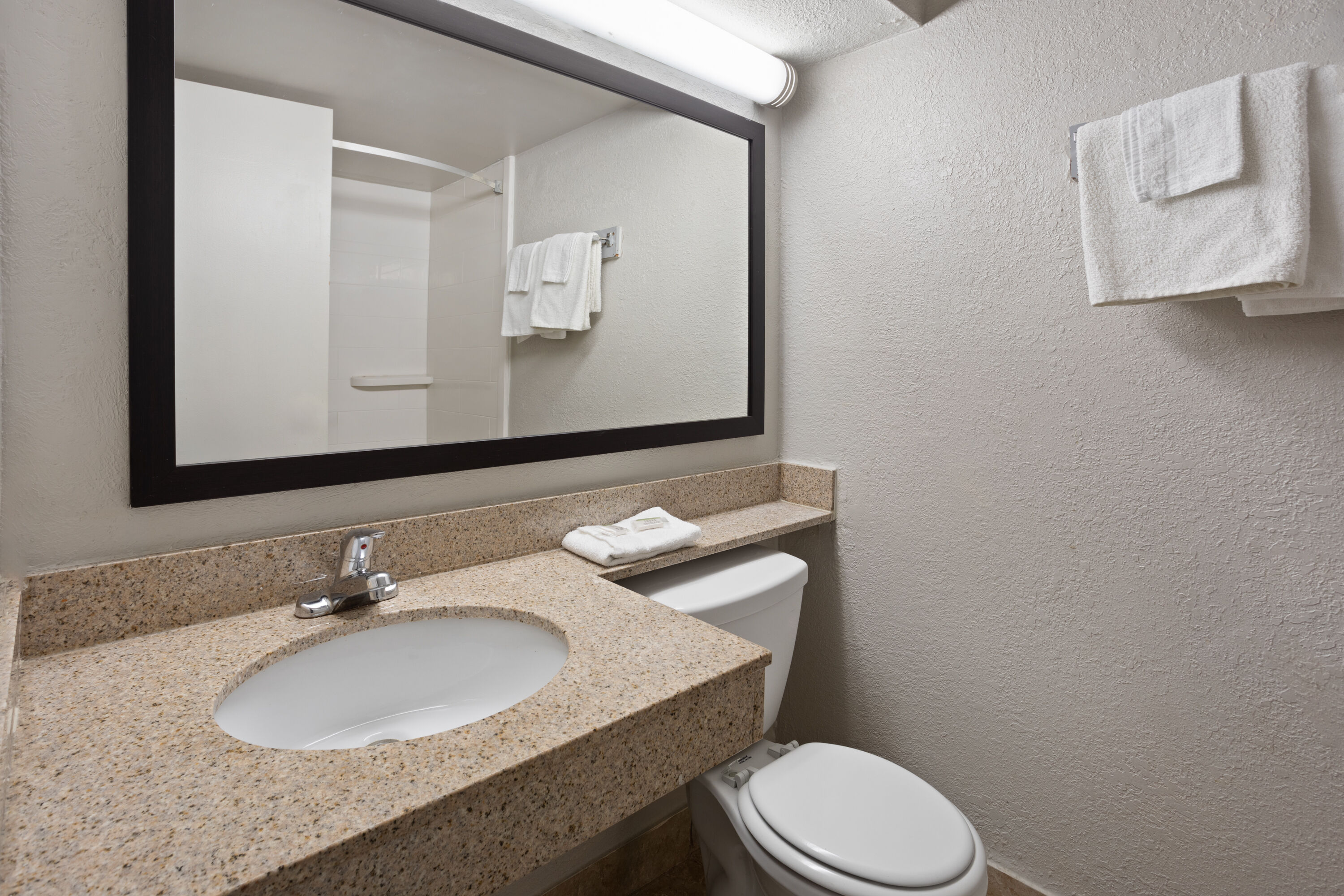 Guest room bath at the Days Inn by Wyndham Ann Arbor in Ann Arbor, Michigan