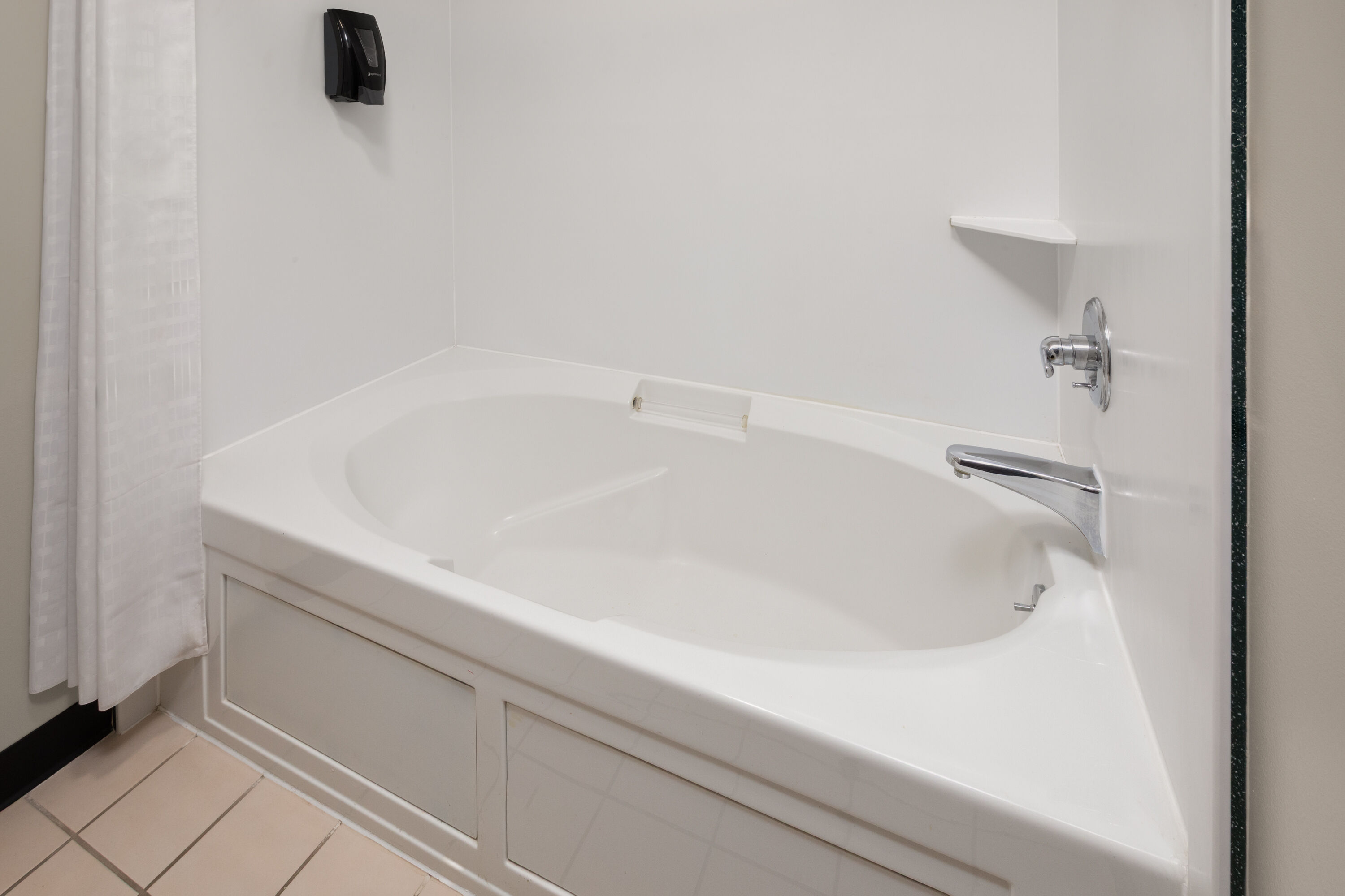 Guest room bath at the Days Inn by Wyndham Bad Axe in Bad Axe, Michigan