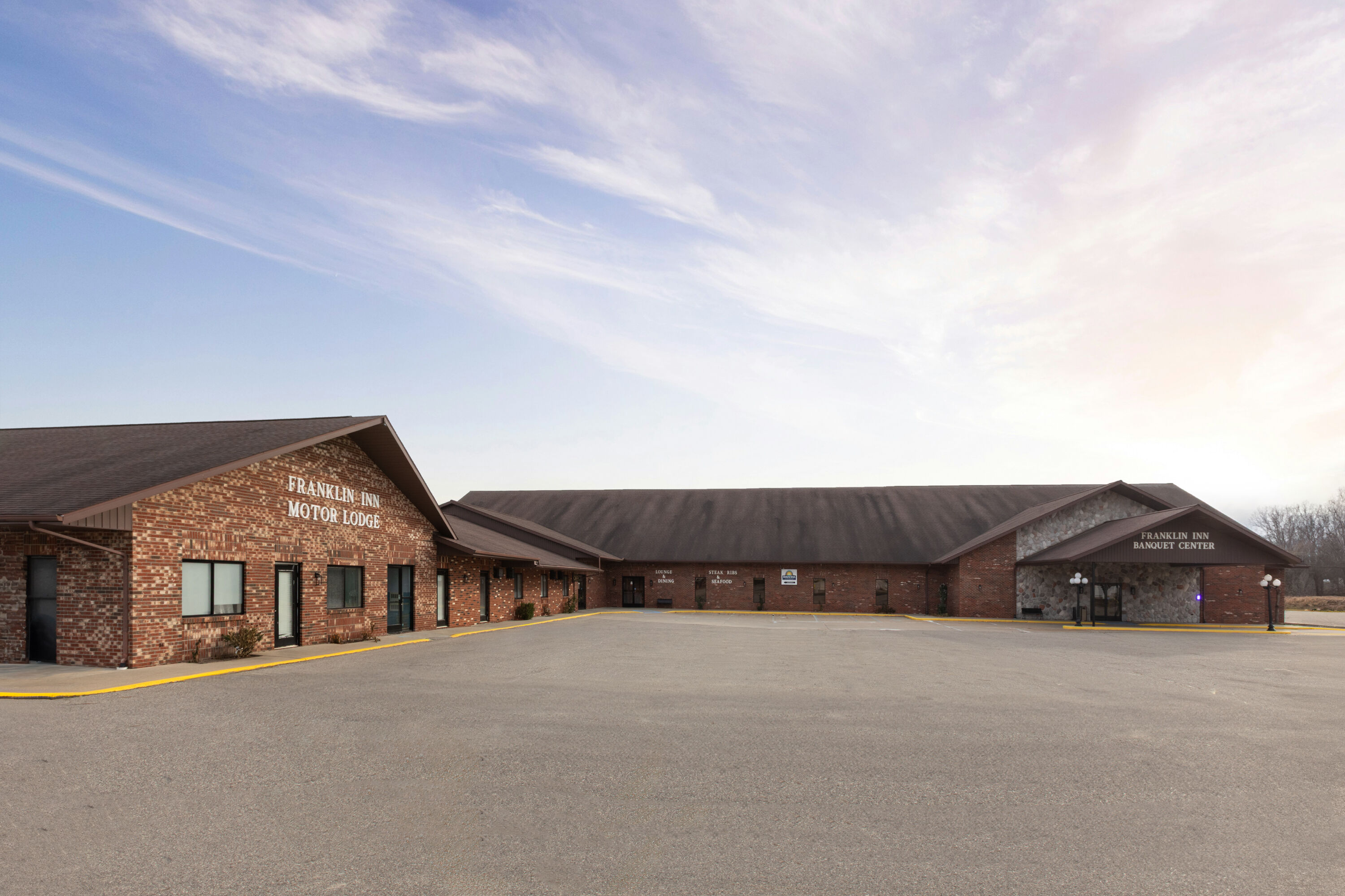 Exterior Day Image of Days Inn by Wyndham Bad Axe hotel in Bad Axe, Michigan