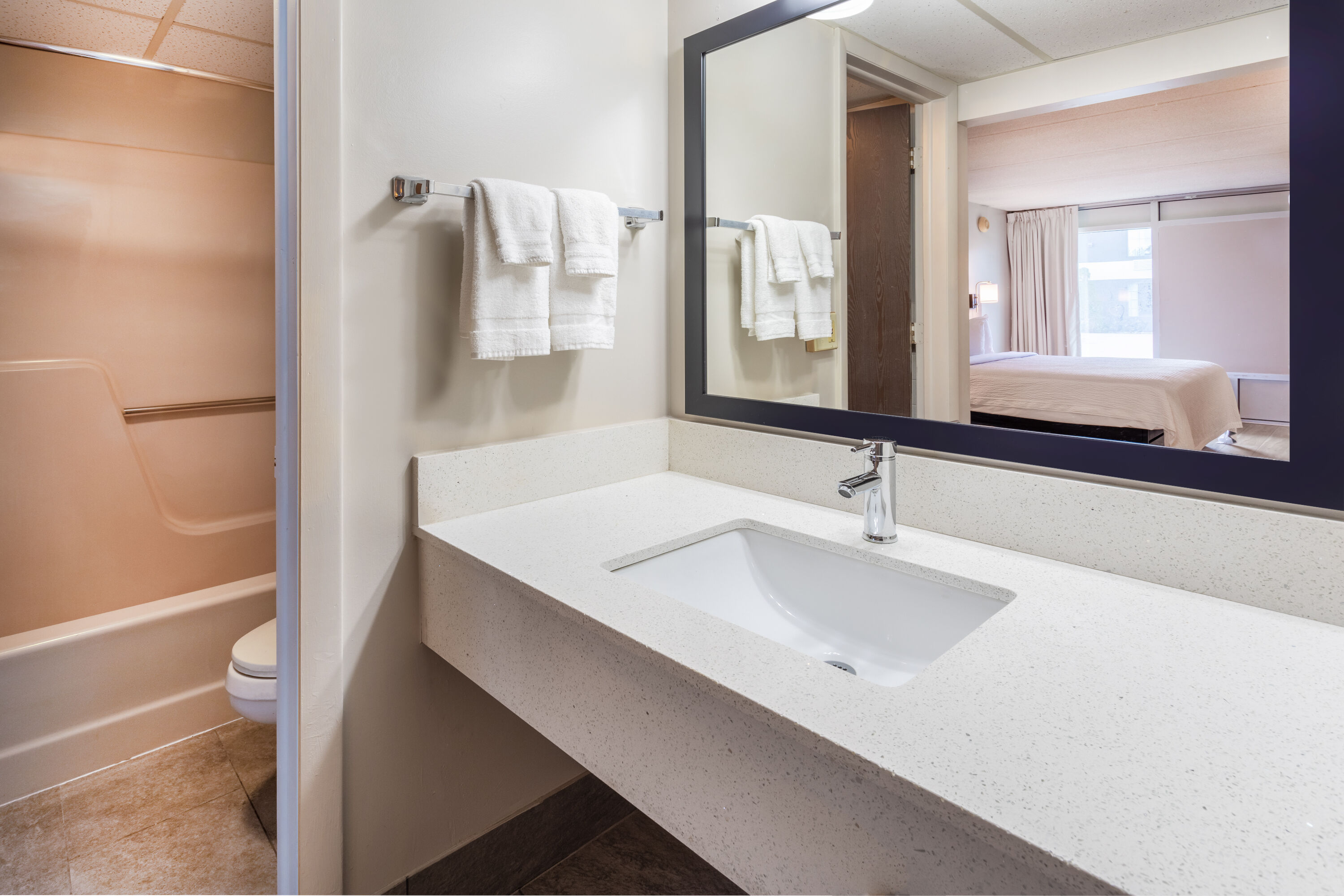 Guest room bath at the Days Inn by Wyndham Birch Run in Birch Run, Michigan