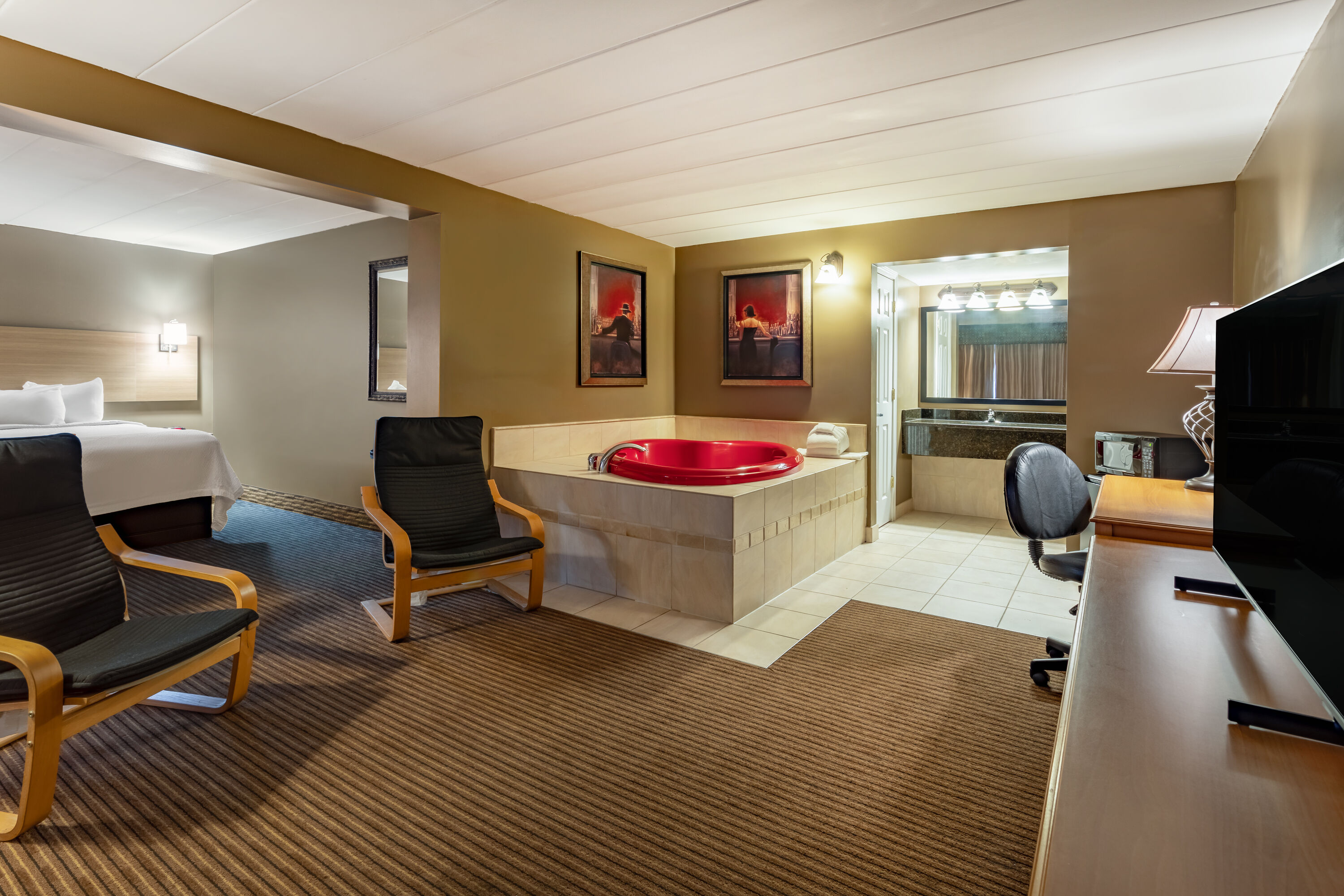 Guest room at the Days Inn by Wyndham Birch Run in Birch Run, Michigan