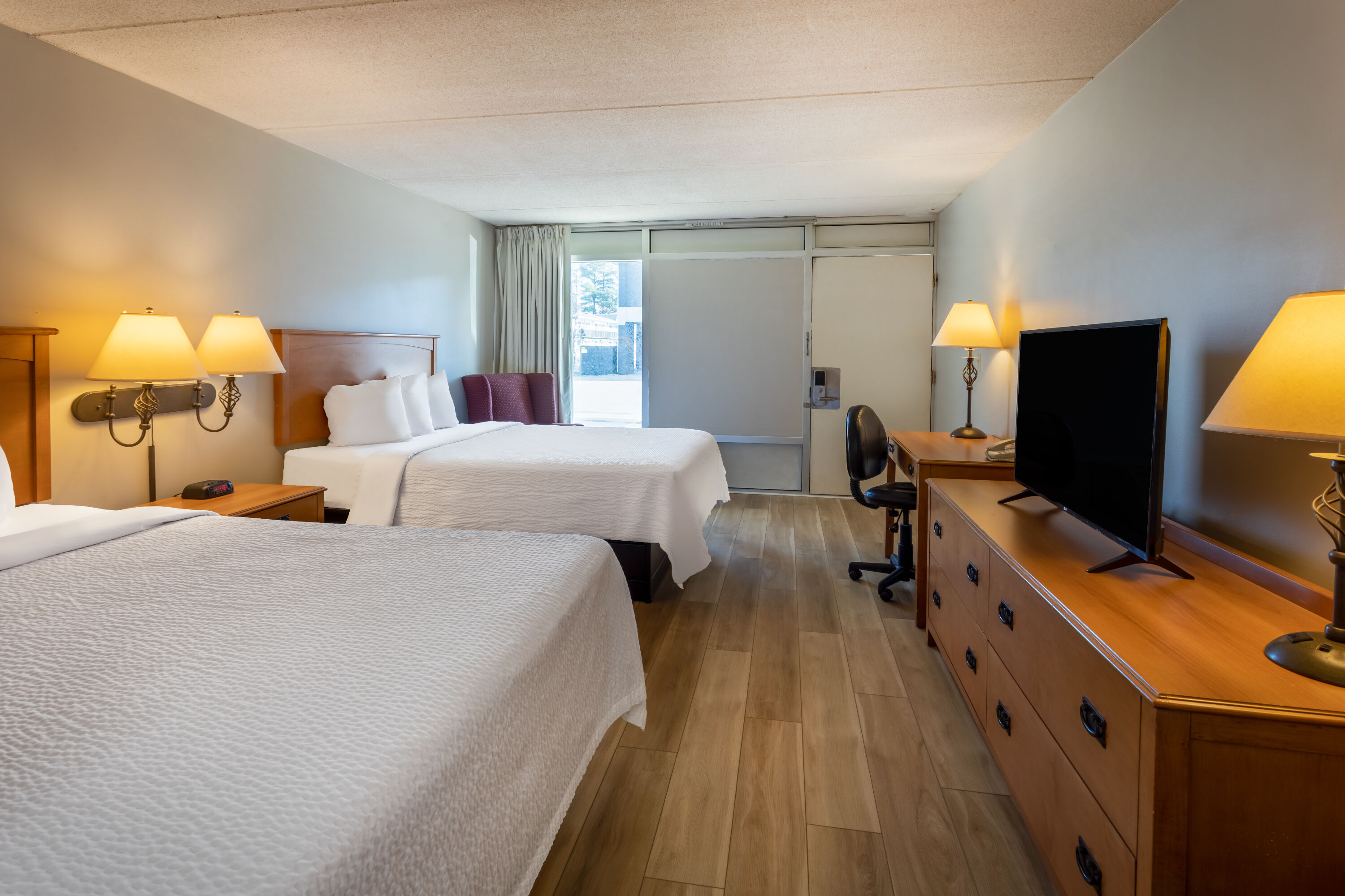 Guest room at the Days Inn by Wyndham Birch Run in Birch Run, Michigan