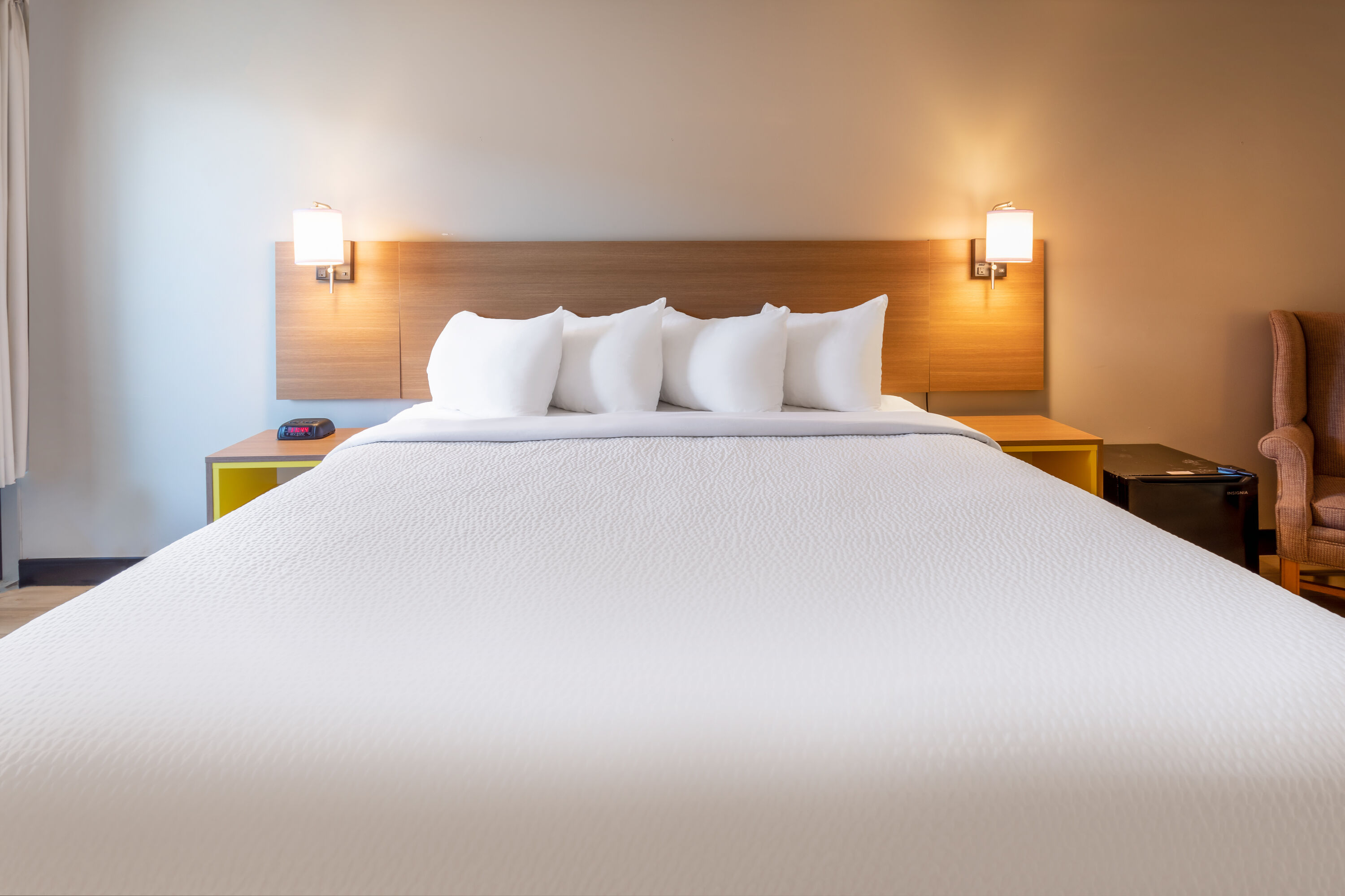 Guest room at the Days Inn by Wyndham Birch Run in Birch Run, Michigan