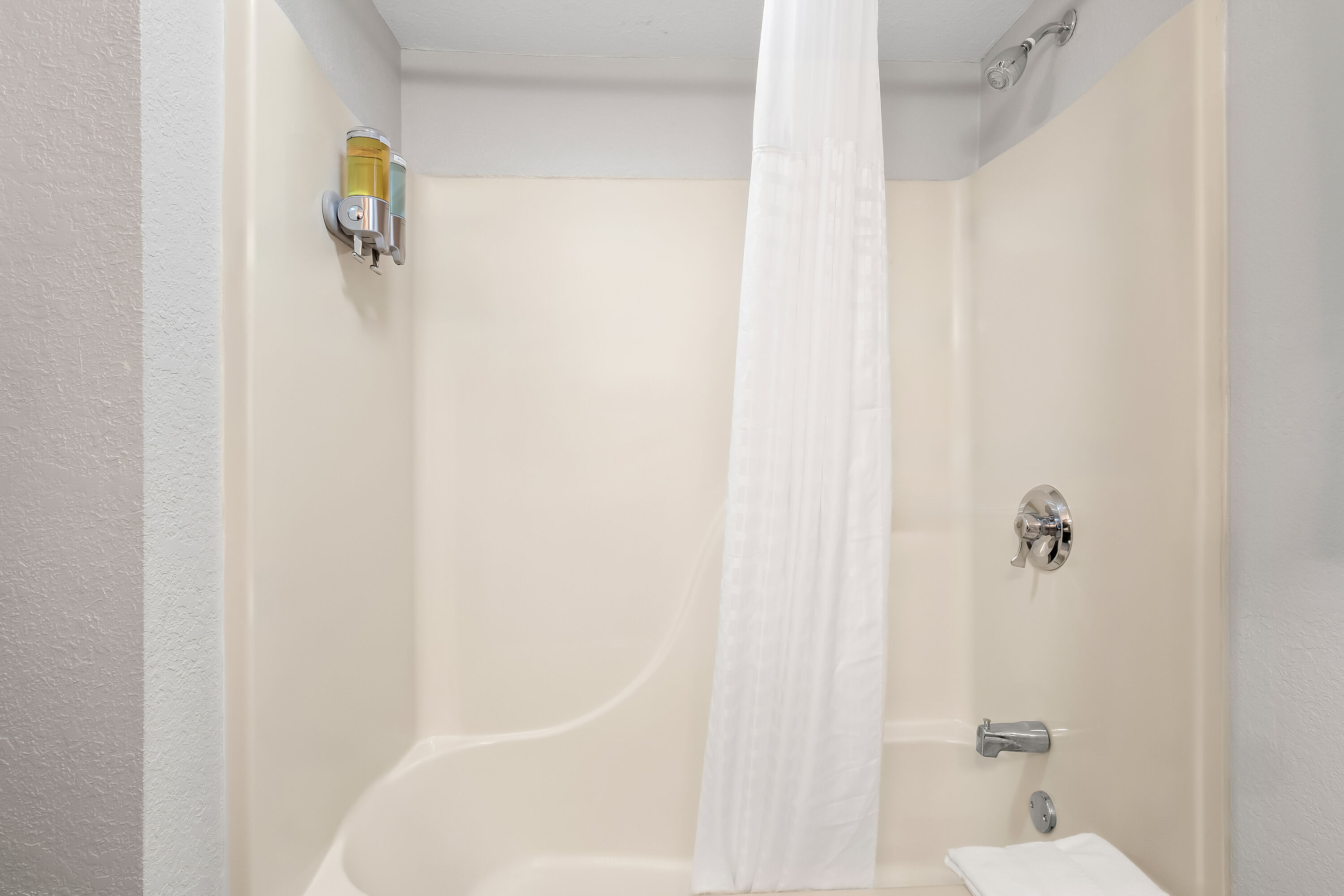 Guest room bath at the Days Inn by Wyndham Hillsdale in Hillsdale, Michigan