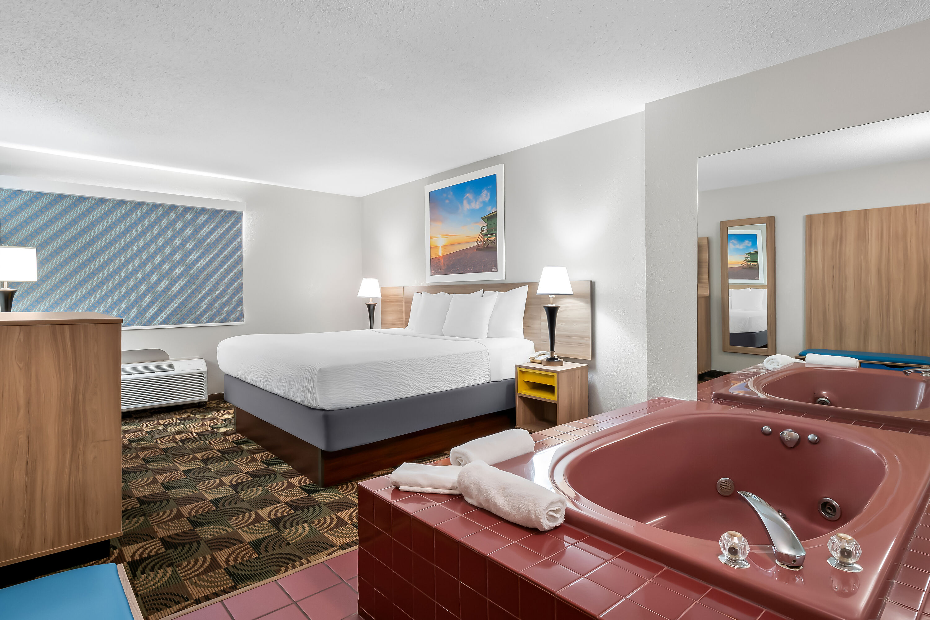 King bed guest room at the Days Inn by Wyndham Hillsdale in Hillsdale, Michigan