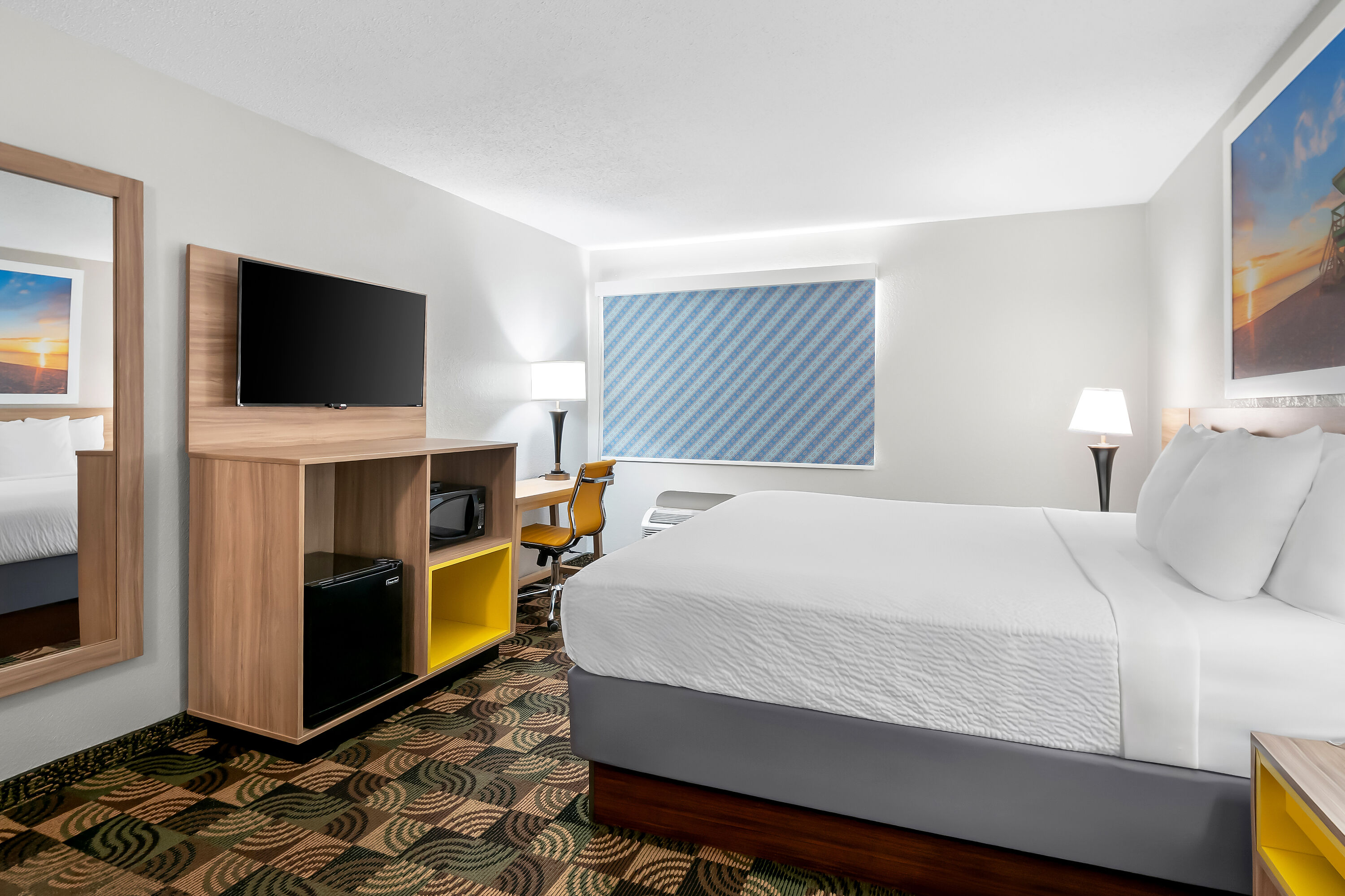 King bed guest room at the Days Inn by Wyndham Hillsdale in Hillsdale, Michigan