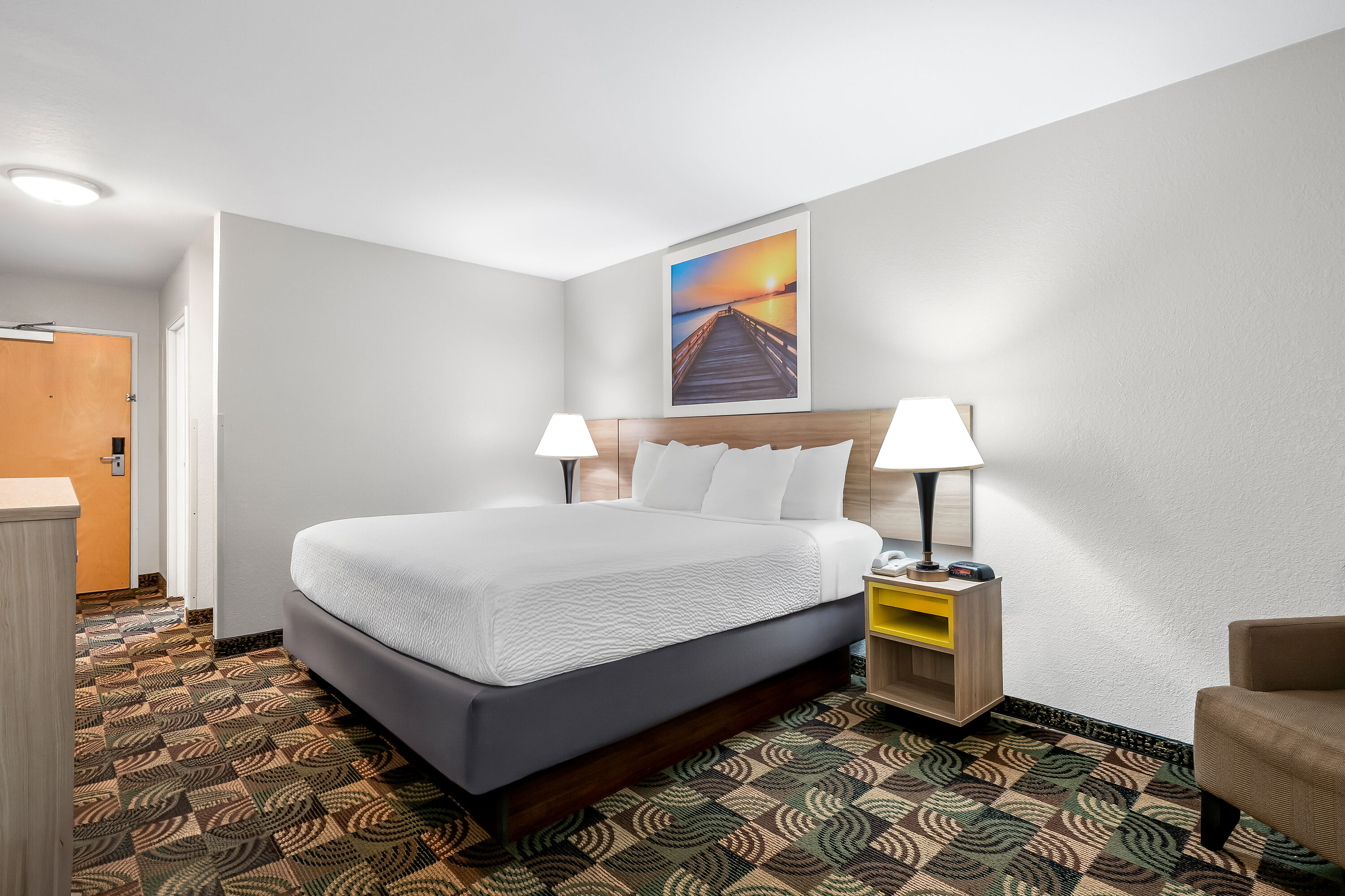 King bed guest room at the Days Inn by Wyndham Hillsdale in Hillsdale, Michigan