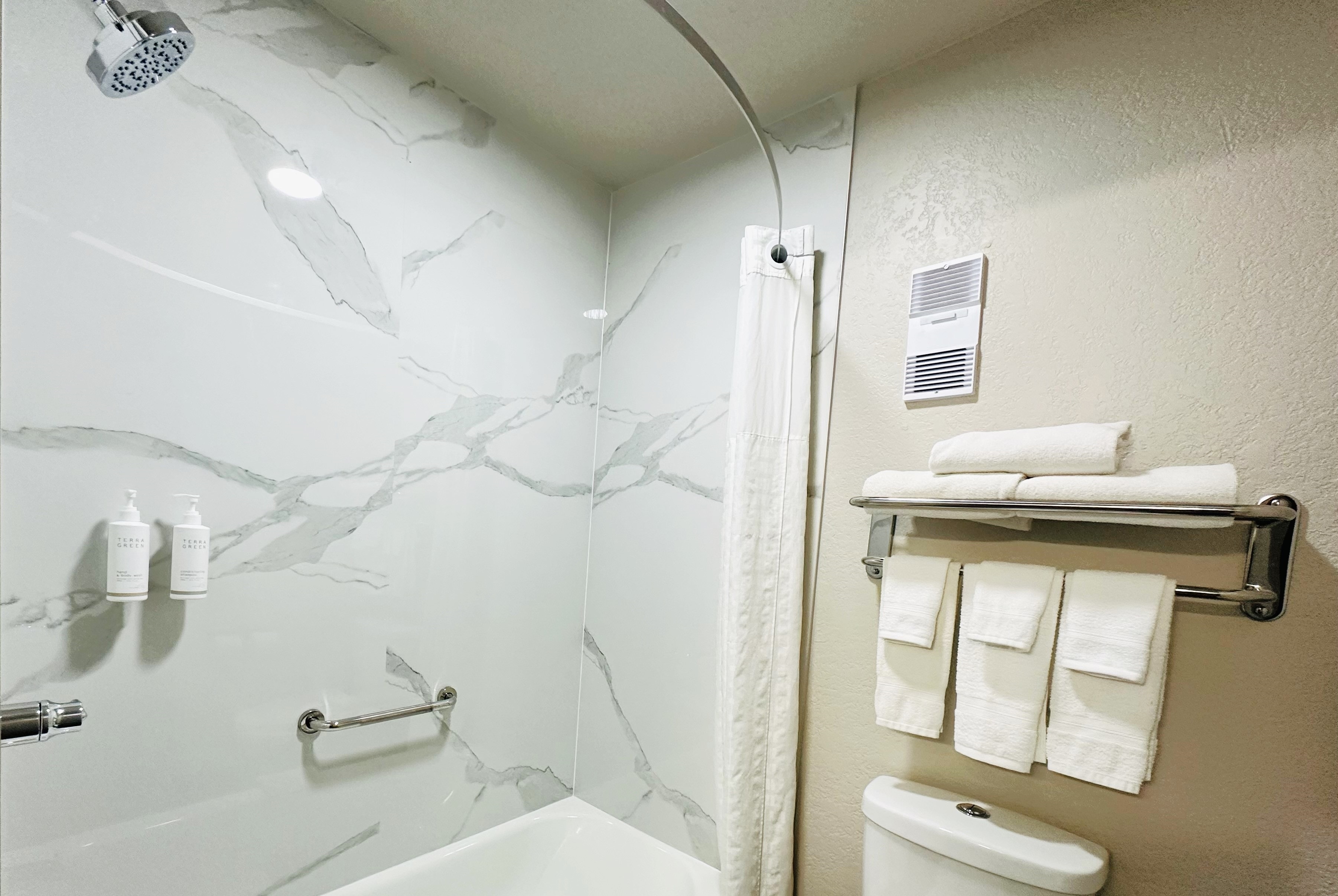 Guest room bath at the Days Inn by Wyndham Holland in Holland, Michigan