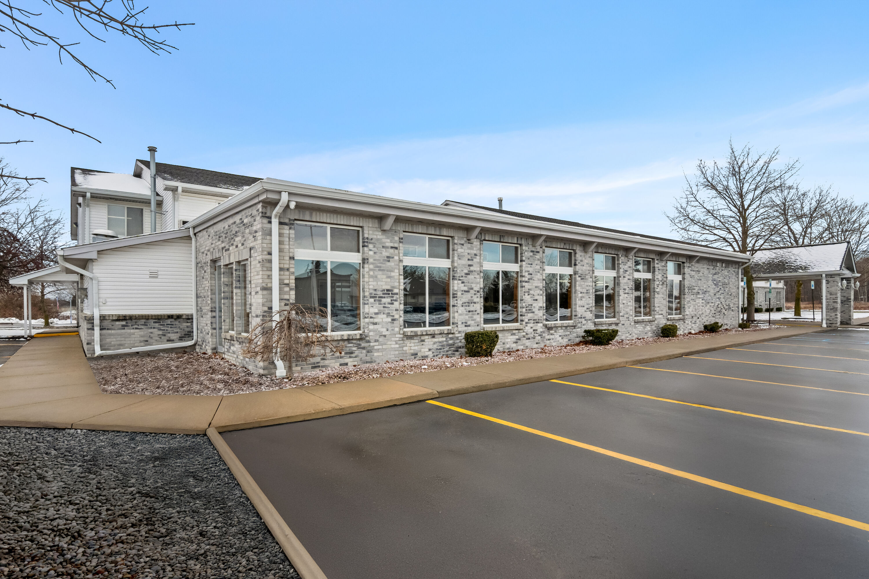 Exterior Day Image of Days Inn by Wyndham Imlay City hotel in Imlay City, Michigan