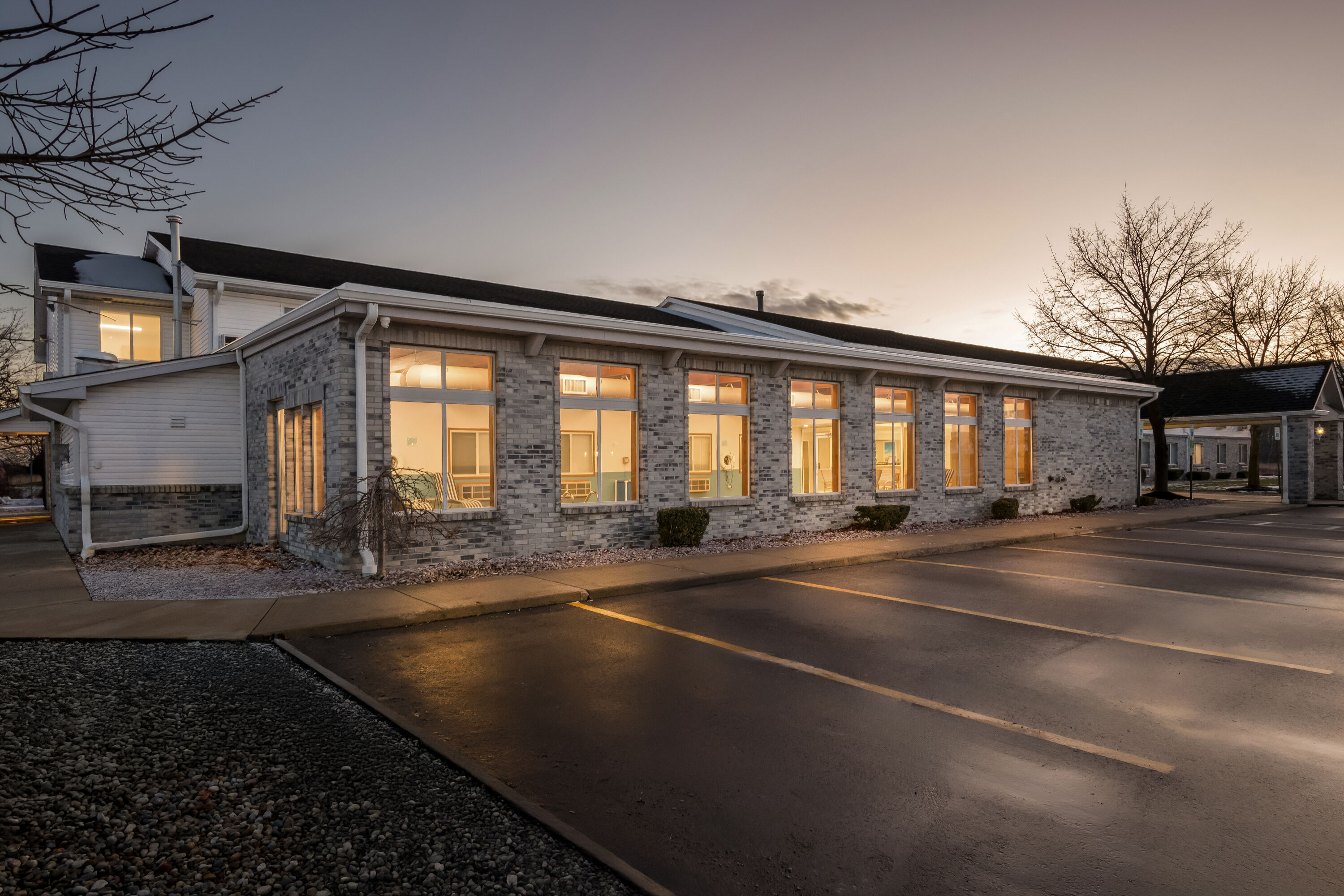 Exterior Night Image of Days Inn by Wyndham Imlay City hotel in Imlay City, Michigan