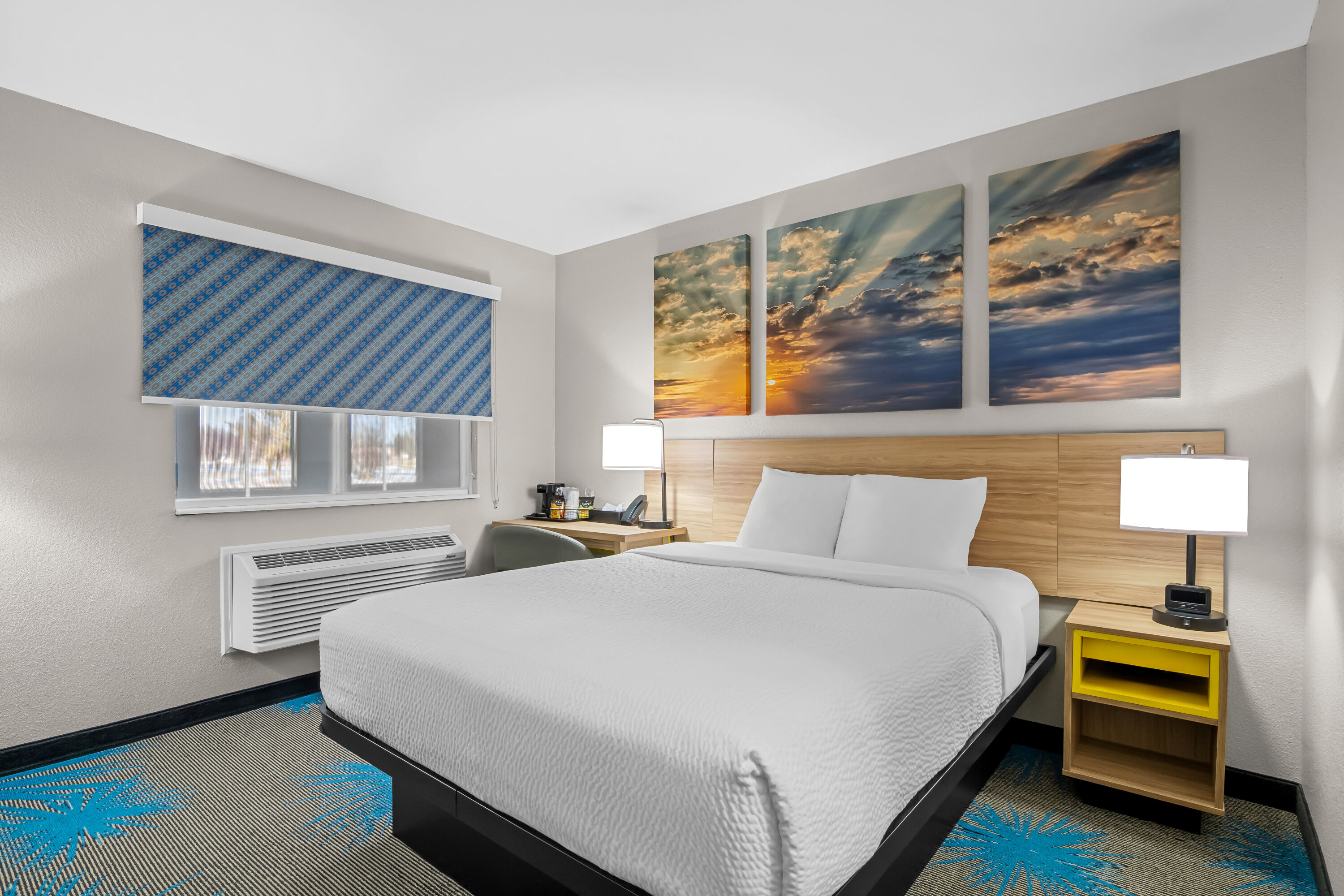 King bed guest room at the Days Inn by Wyndham Imlay City in Imlay City, Michigan