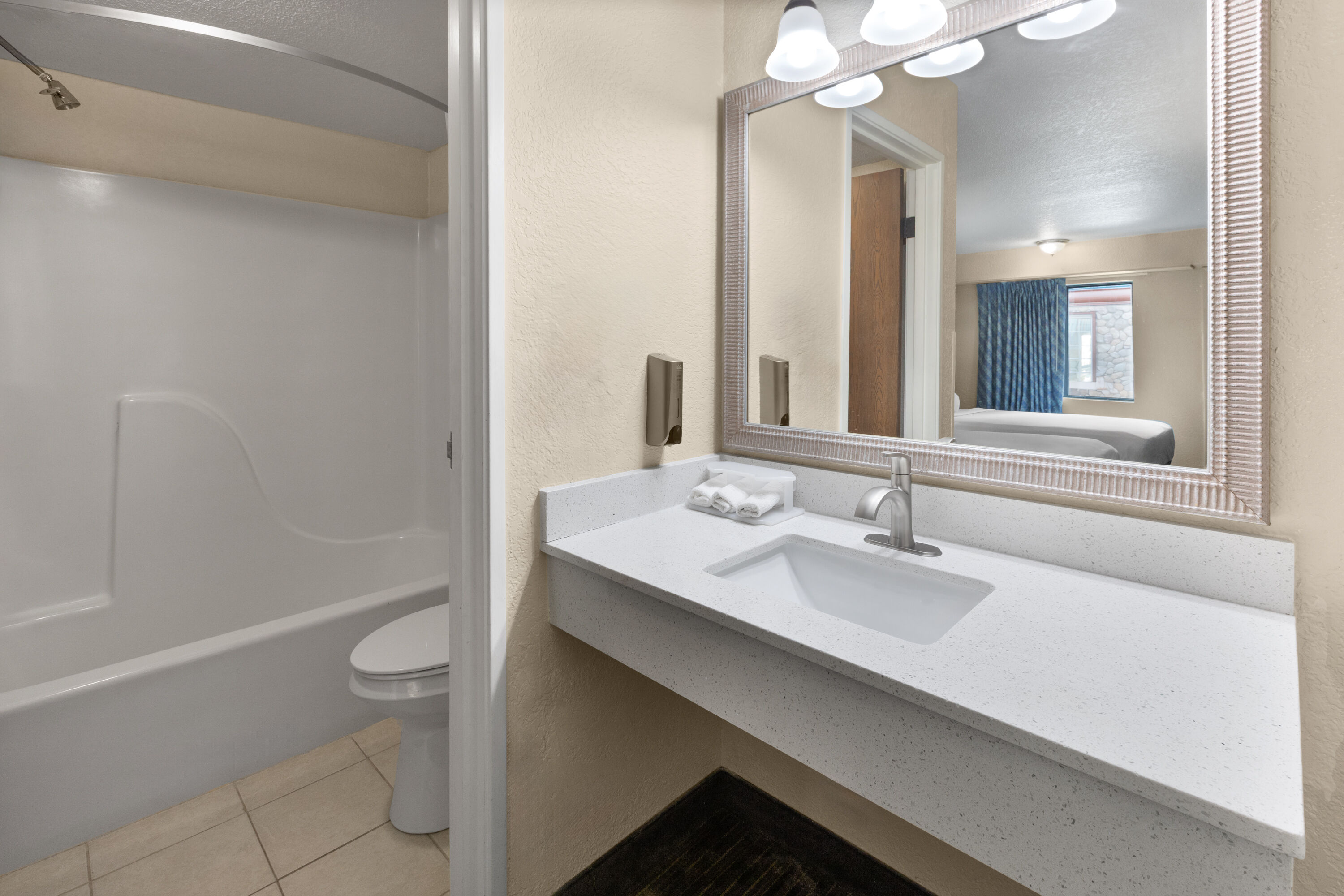 Guest room bath at the Days Inn by Wyndham Mackinaw City/Bridgeview Area in Mackinaw City, Michigan