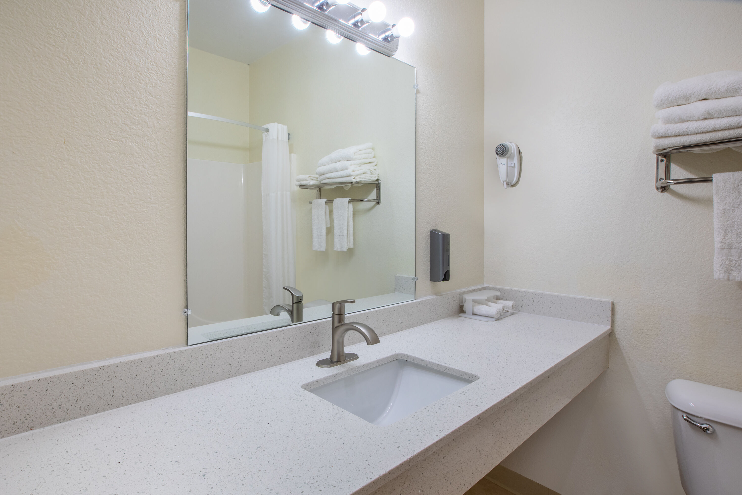 Guest room bath at the Days Inn by Wyndham Mackinaw City/Bridgeview Area in Mackinaw City, Michigan