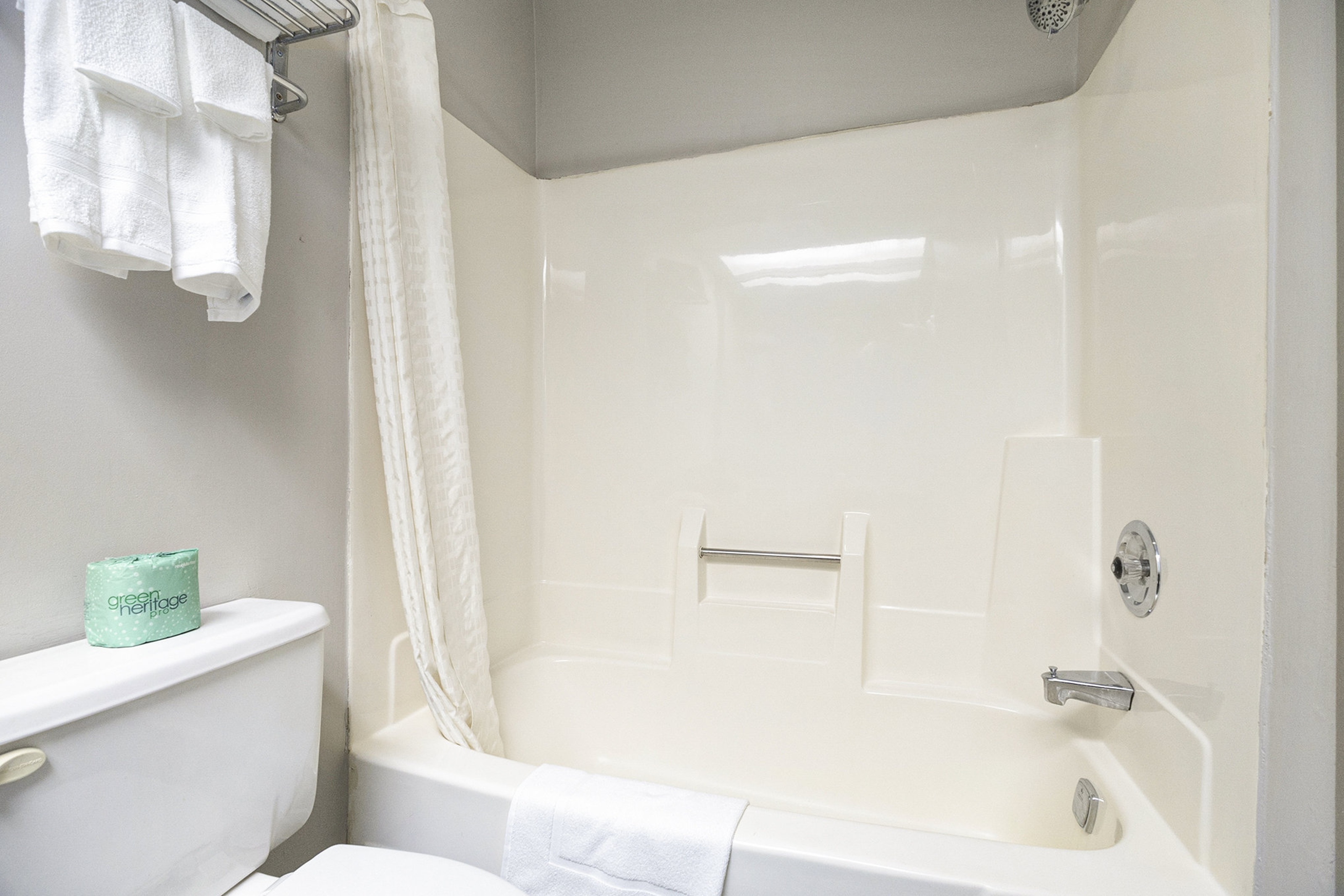 Guest room bath at the Days Inn & Suites by Wyndham Norton Shores/Muskegon in Norton Shores, Michigan