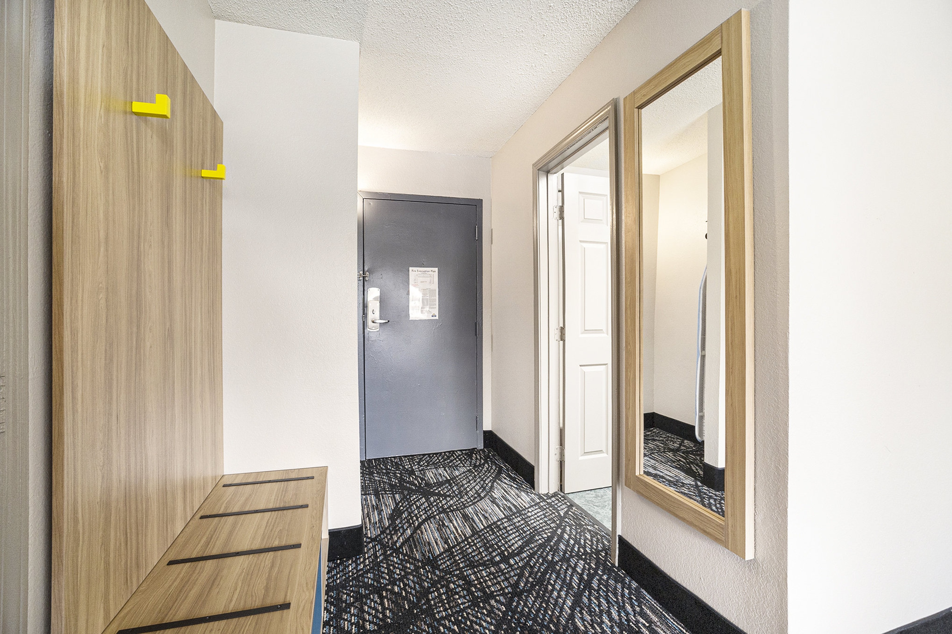 Guest room at the Days Inn & Suites by Wyndham Norton Shores/Muskegon in Norton Shores, Michigan