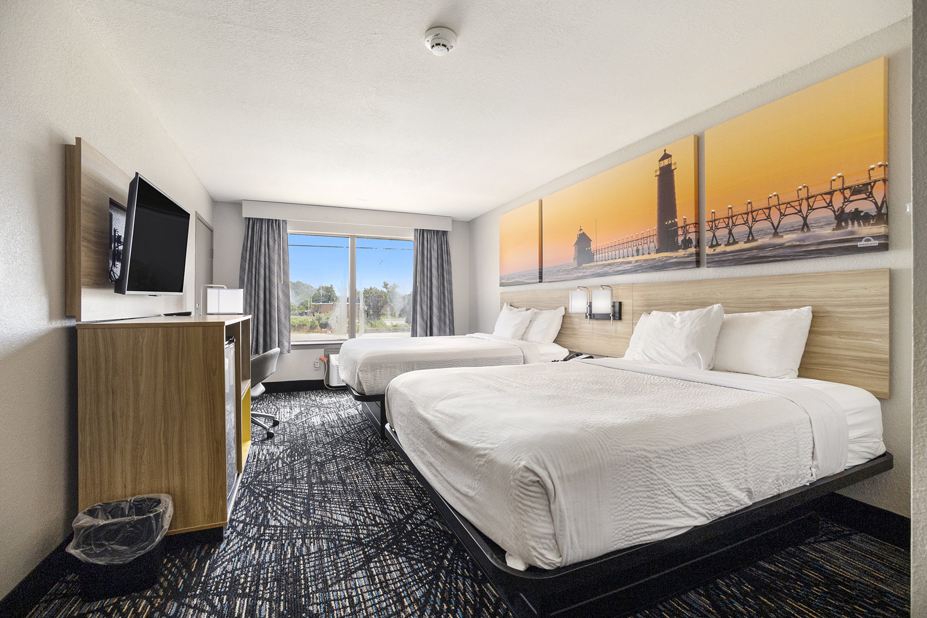 Guest room at the Days Inn & Suites by Wyndham Norton Shores/Muskegon in Norton Shores, Michigan