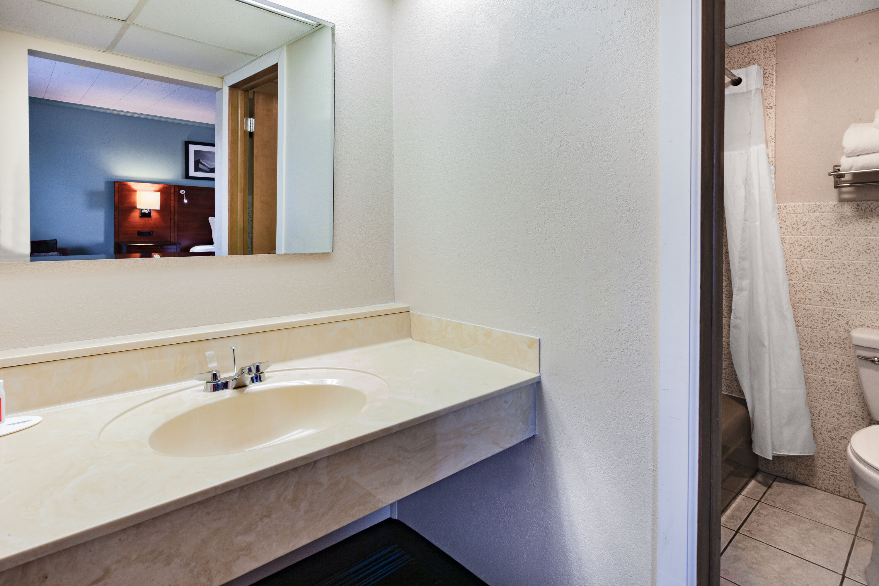 Guest room bath at the Days Inn & Suites by Wyndham St. Ignace Lakefront in St Ignace, Michigan