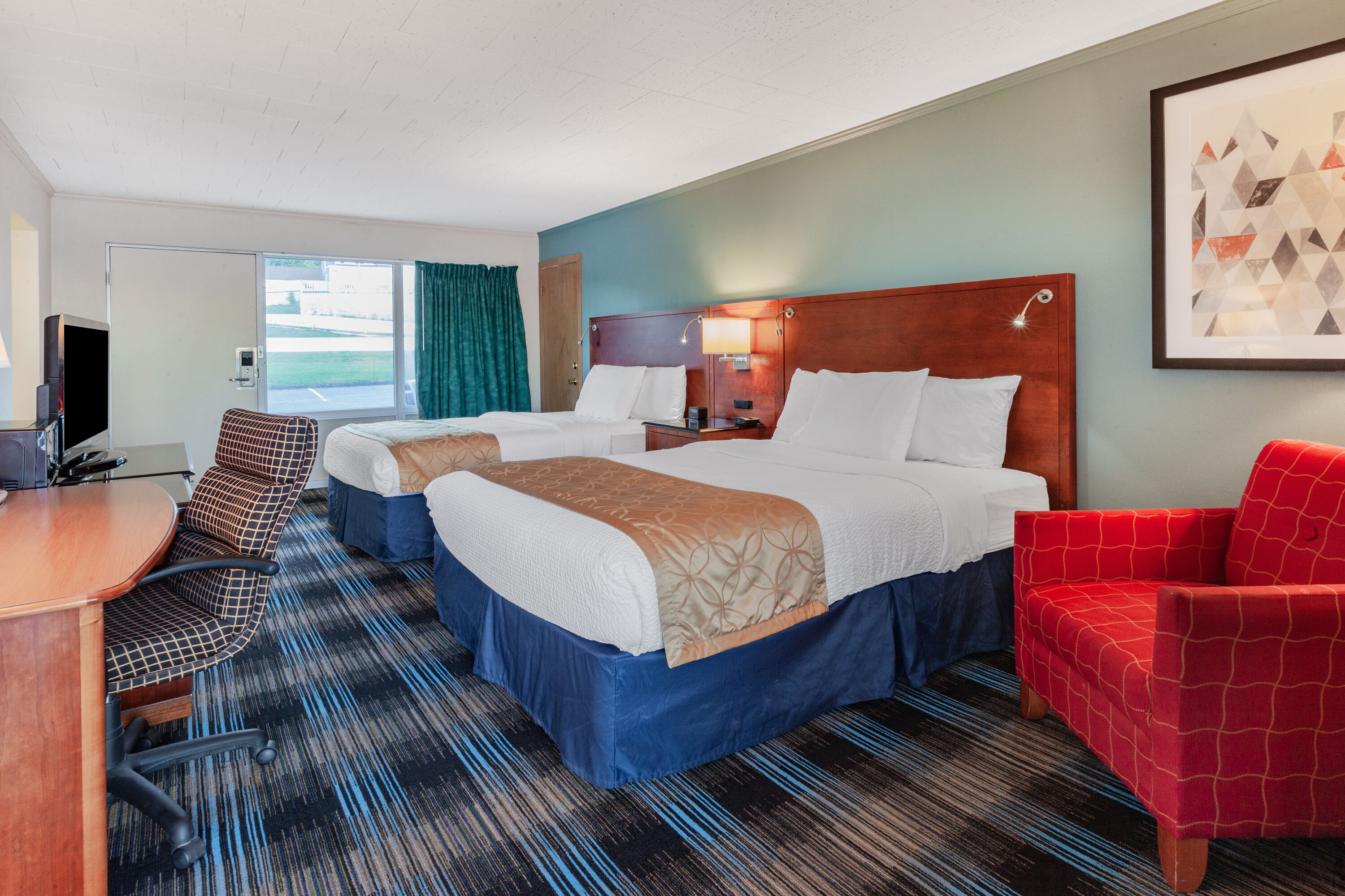 Guest room at the Days Inn & Suites by Wyndham St. Ignace Lakefront in St Ignace, Michigan