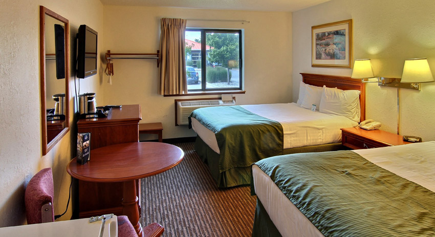 Guest room at the Days Inn & Suites by Wyndham Traverse City in Traverse City, Michigan