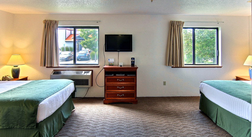 Guest room at the Days Inn & Suites by Wyndham Traverse City in Traverse City, Michigan