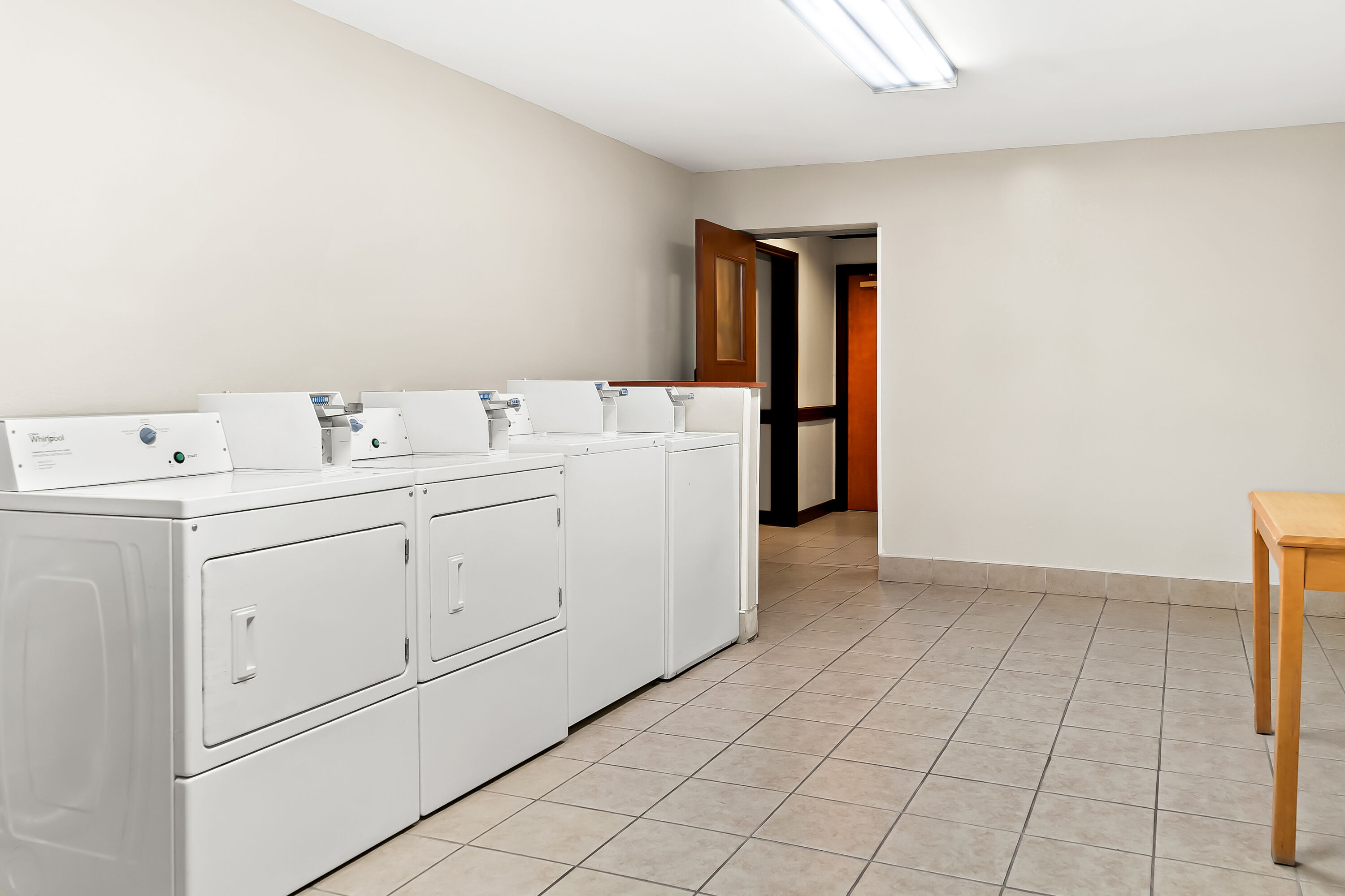 Laundry facilities at Days Inn & Suites by Wyndham Warren in Warren, Michigan