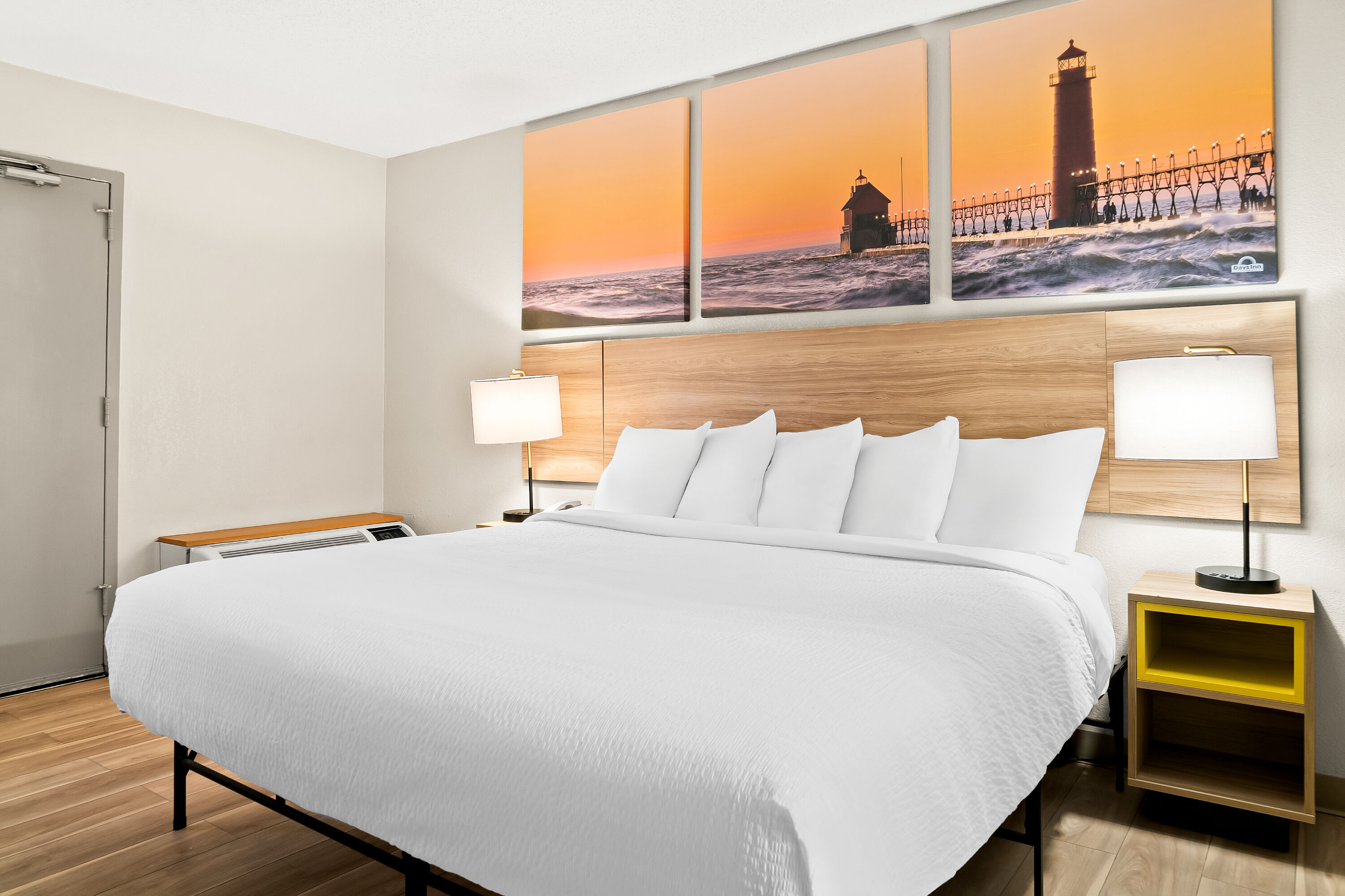 King bed guest room at the Days Inn & Suites by Wyndham Warren in Warren, Michigan