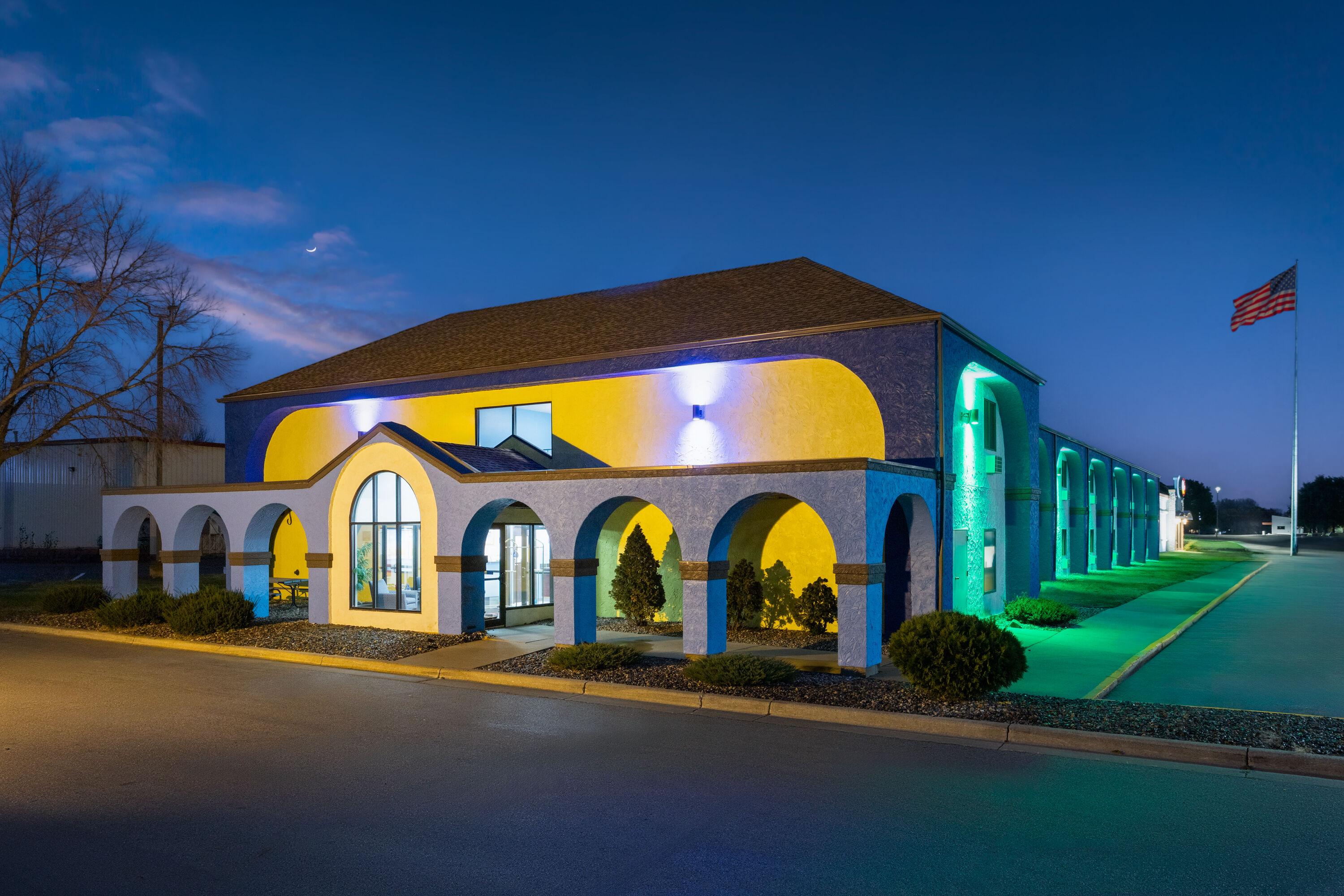 Exterior Dusk Image of Days Inn by Wyndham Austin hotel in Austin, Minnesota