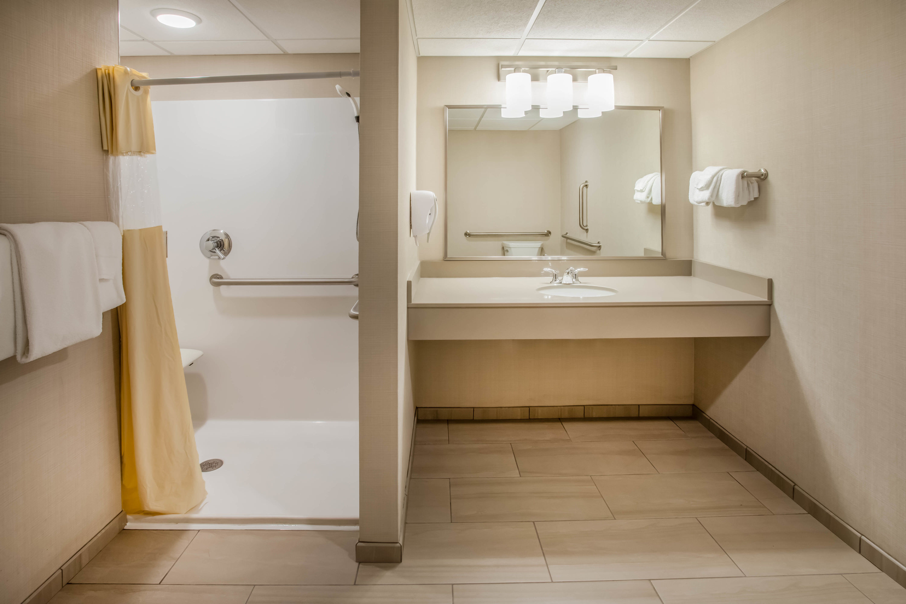 Guest room bath at the Days Inn & Suites by Wyndham Duluth by the Mall in Duluth, Minnesota