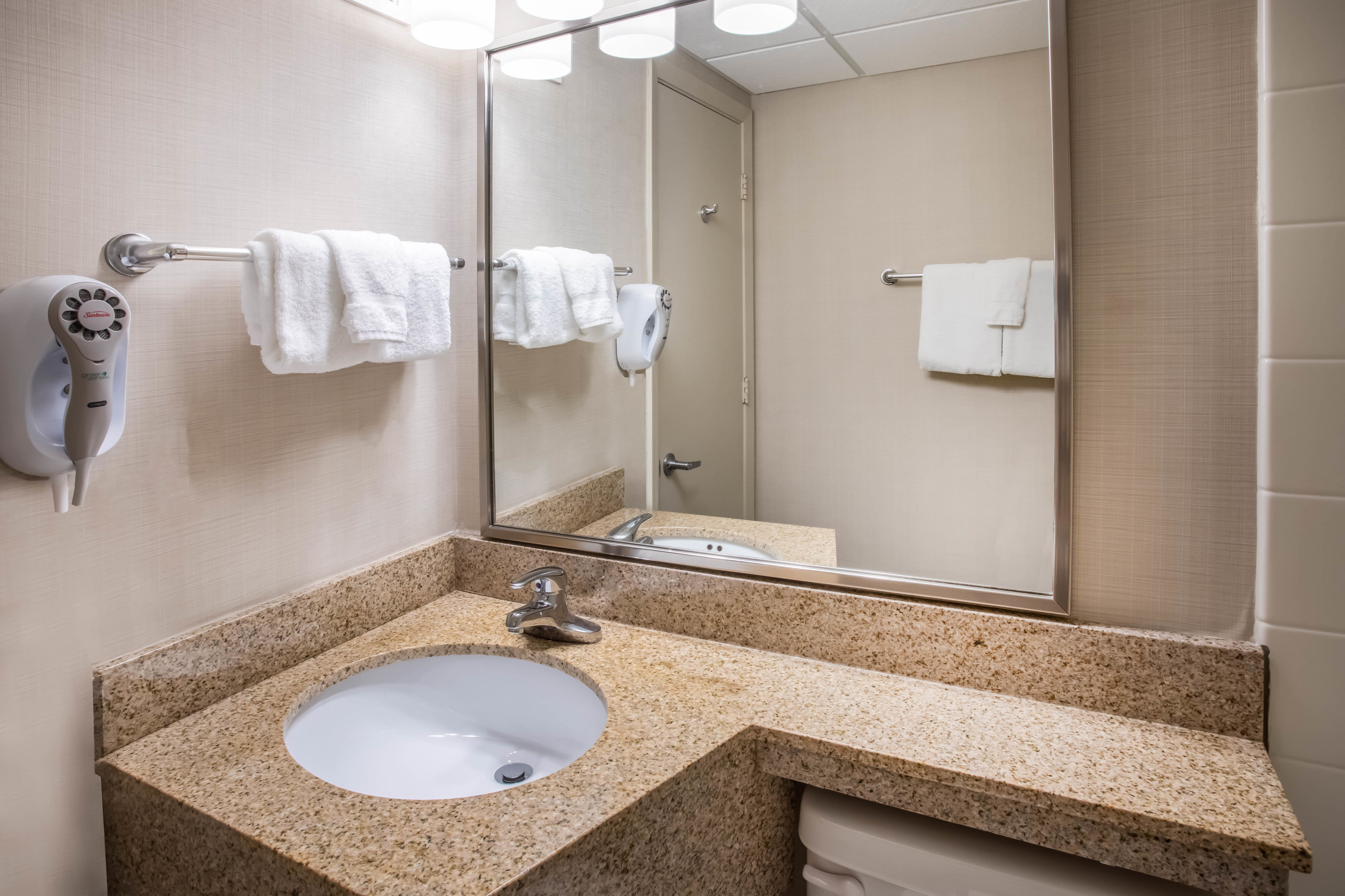 Guest room bath at the Days Inn & Suites by Wyndham Duluth by the Mall in Duluth, Minnesota