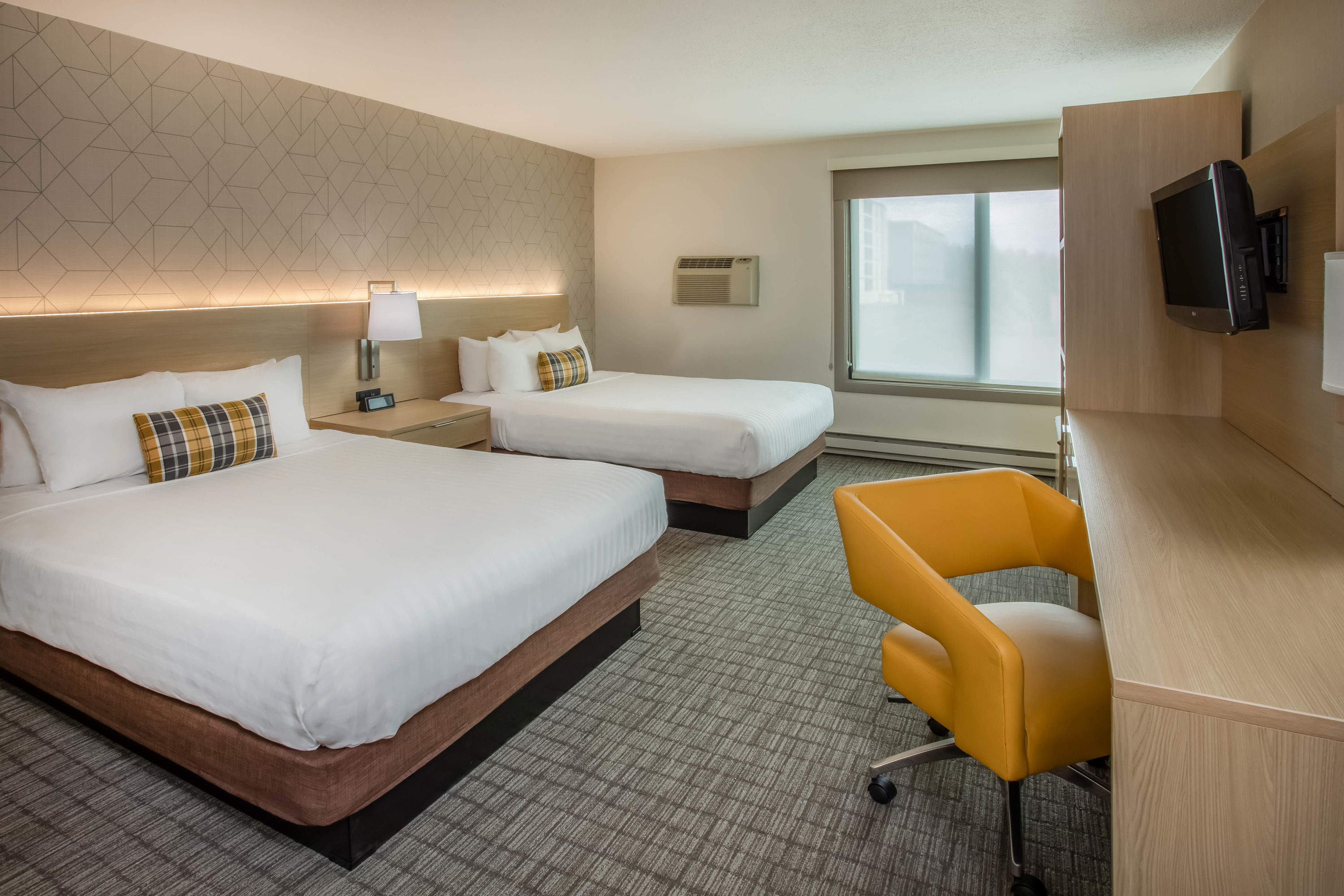 Guest room at the Days Inn & Suites by Wyndham Duluth by the Mall in Duluth, Minnesota