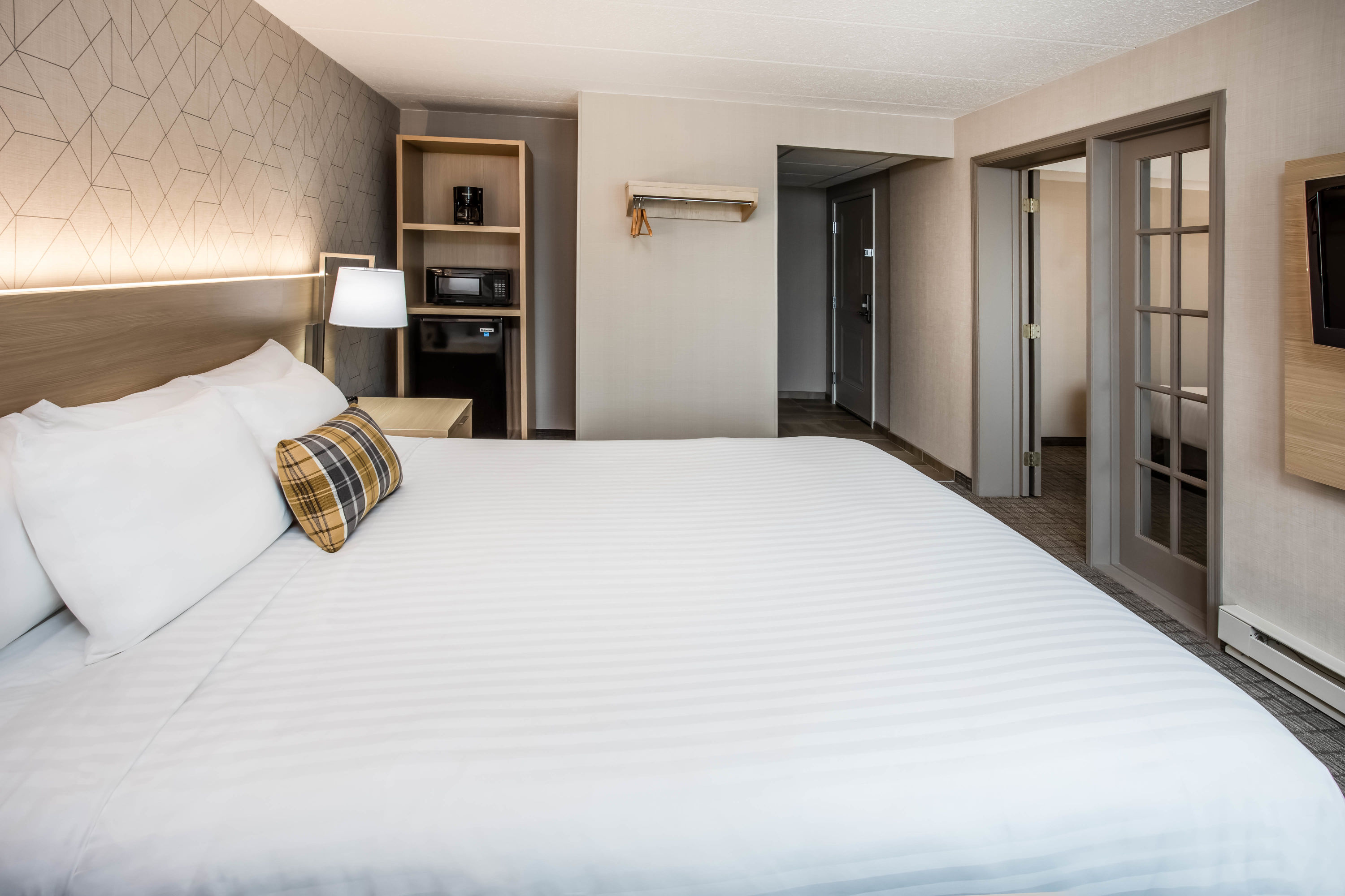 Guest room at the Days Inn & Suites by Wyndham Duluth by the Mall in Duluth, Minnesota