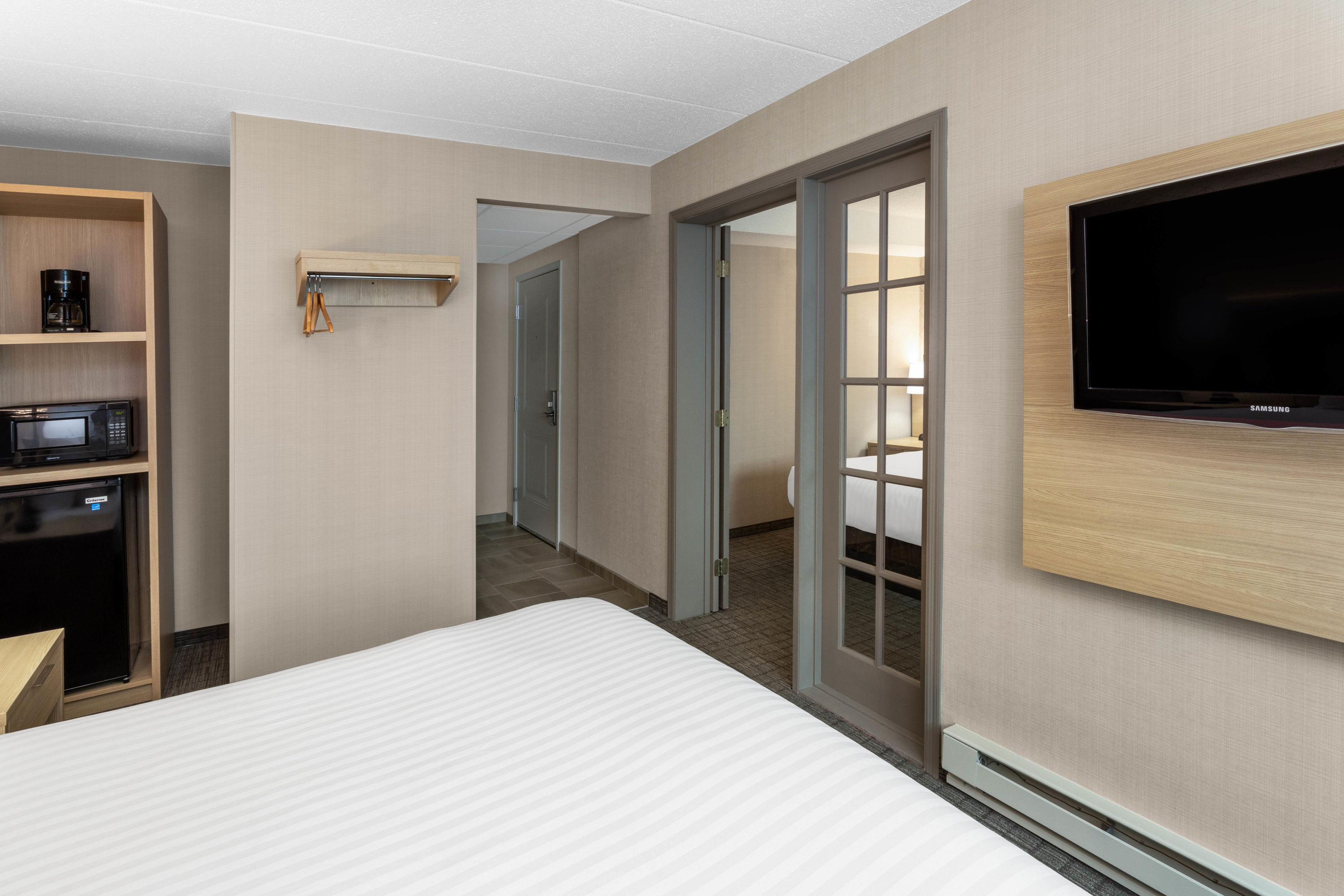 Guest room at the Days Inn & Suites by Wyndham Duluth by the Mall in Duluth, Minnesota