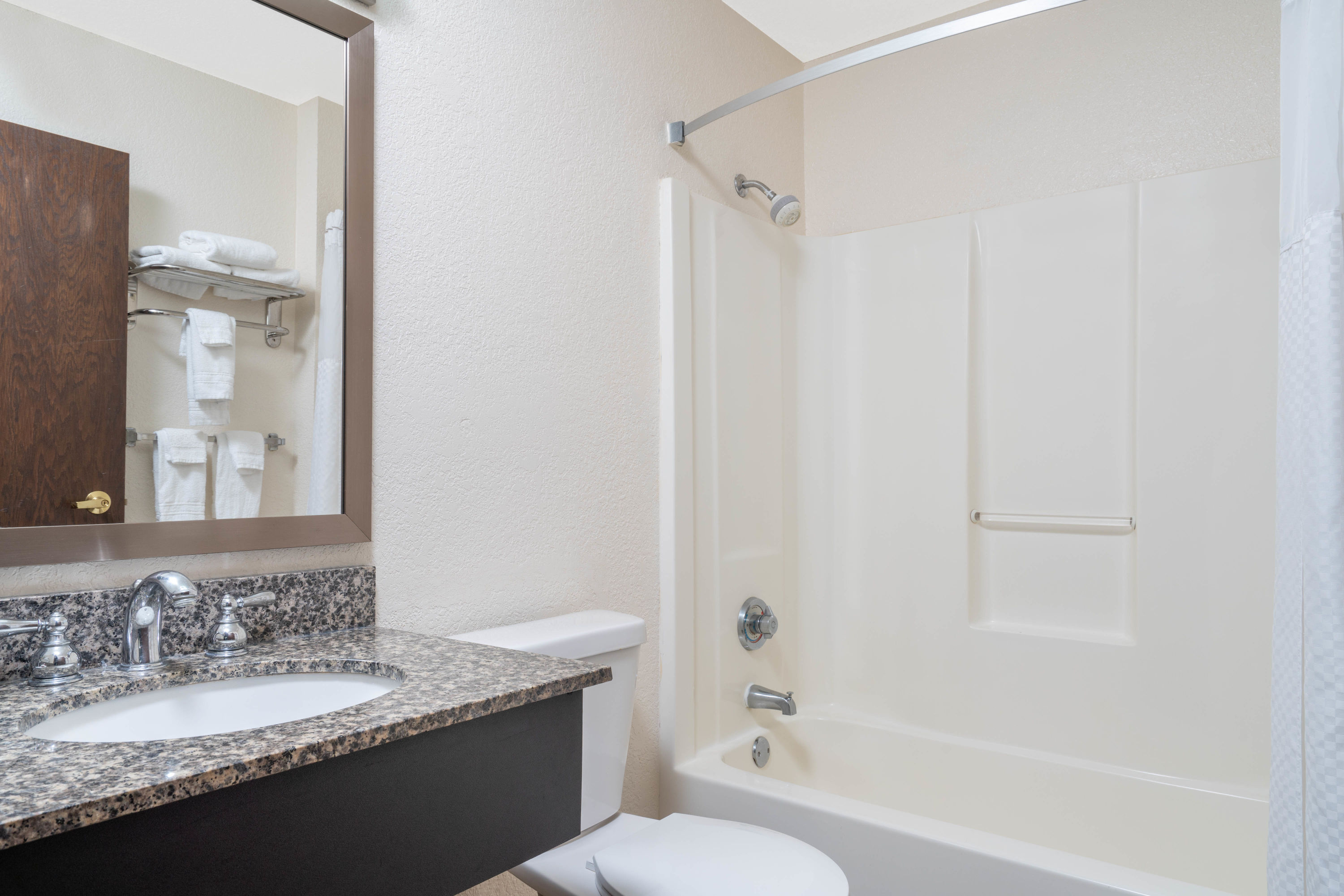 Guest room bath at the Days Inn by Wyndham Faribault in Faribault, Minnesota