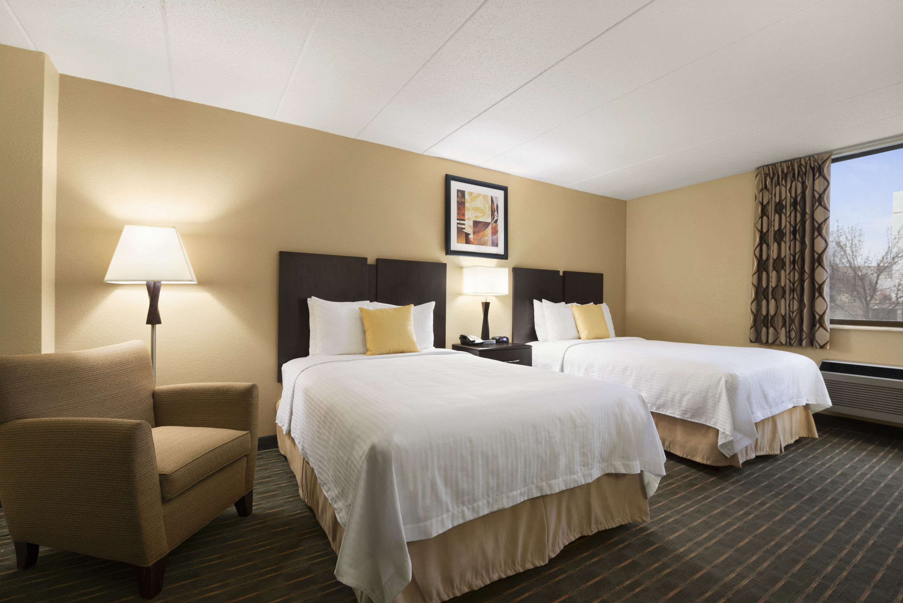 Guest room at the Days Hotel by Wyndham University Ave SE in Minneapolis, Minnesota