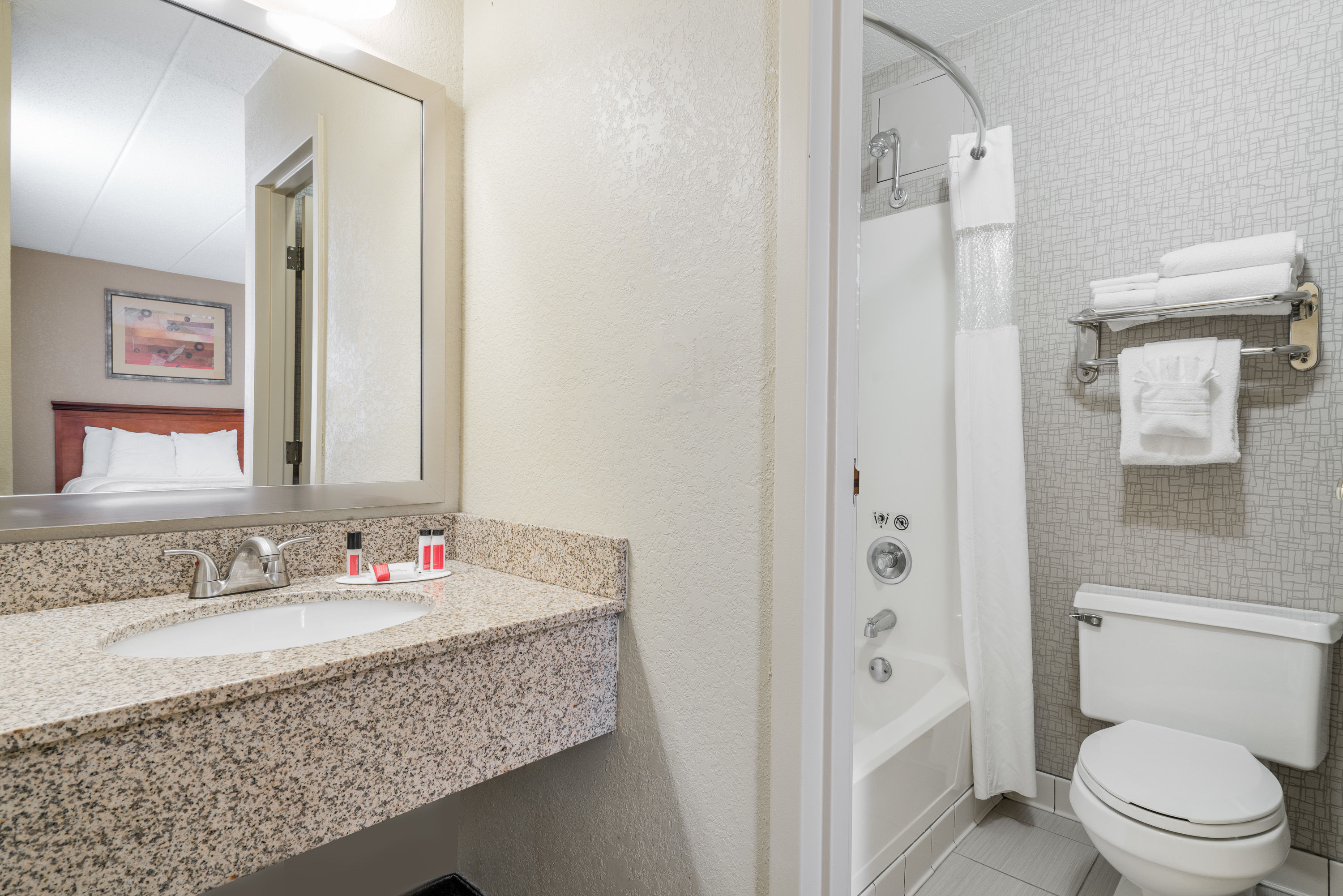 Guest room bath at the Days Hotel by Wyndham University Ave SE in Minneapolis, Minnesota