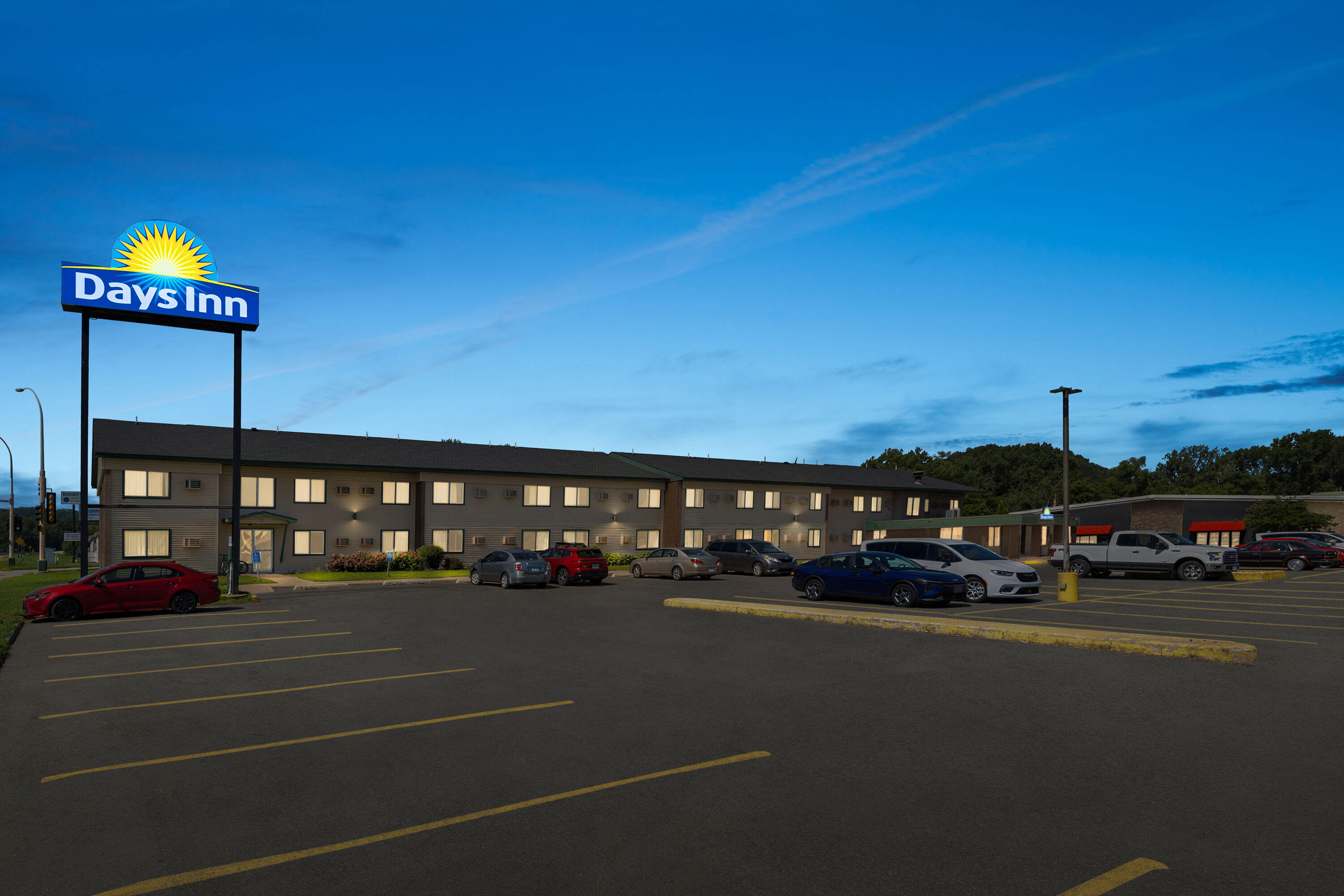 Exterior Night Image of Days Inn by Wyndham Winona hotel in Winona, Minnesota