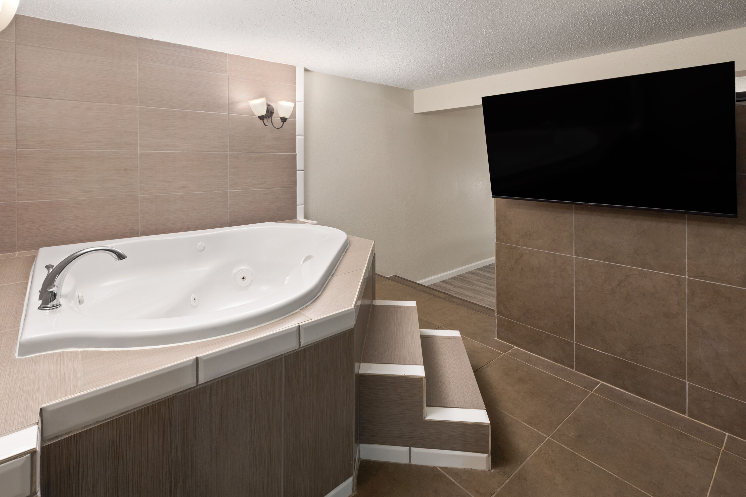 Guest room at the Days Inn & Suites by Wyndham Festus in Festus, Missouri