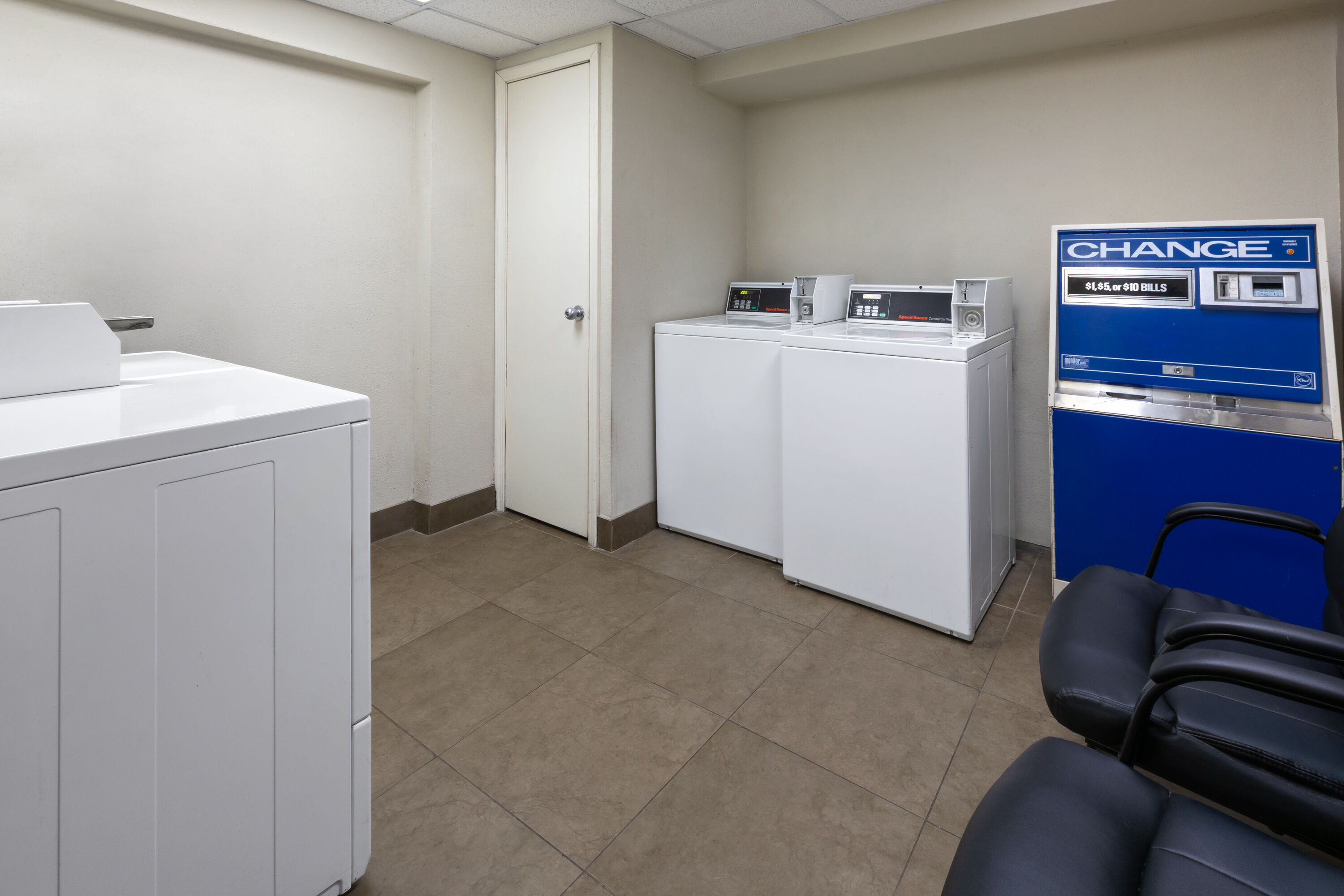 Laundry facilities at Days Inn & Suites by Wyndham Festus in Festus, Missouri