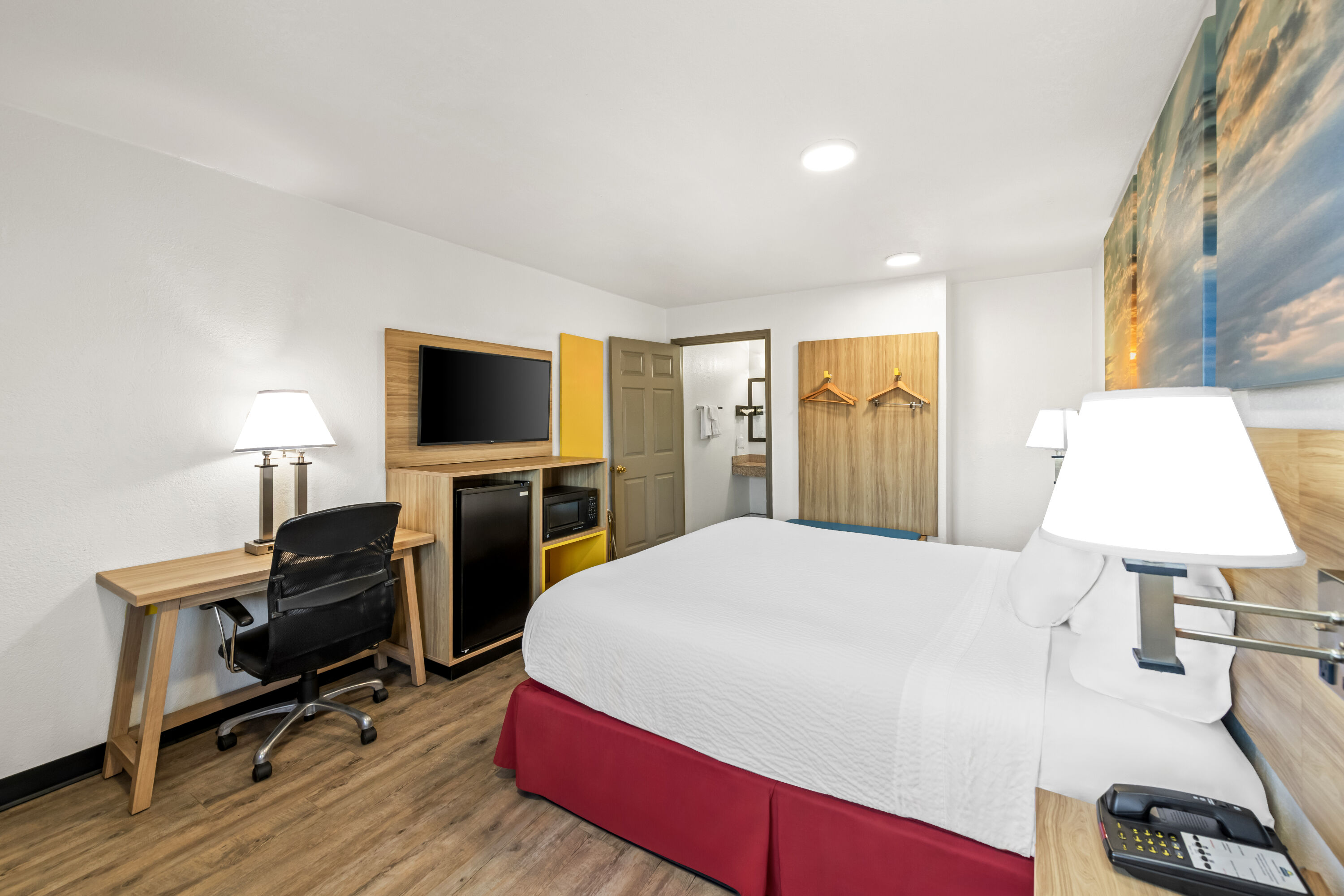 King bed guest room at the Days Inn by Wyndham Independence in Independence, Missouri