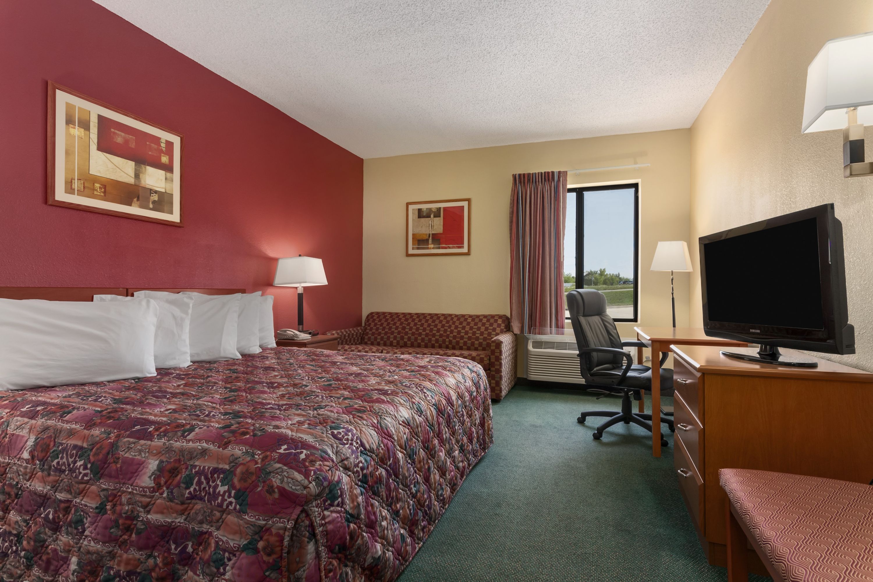 Guest room at the Days Inn by Wyndham Jefferson City in Jefferson City, Missouri