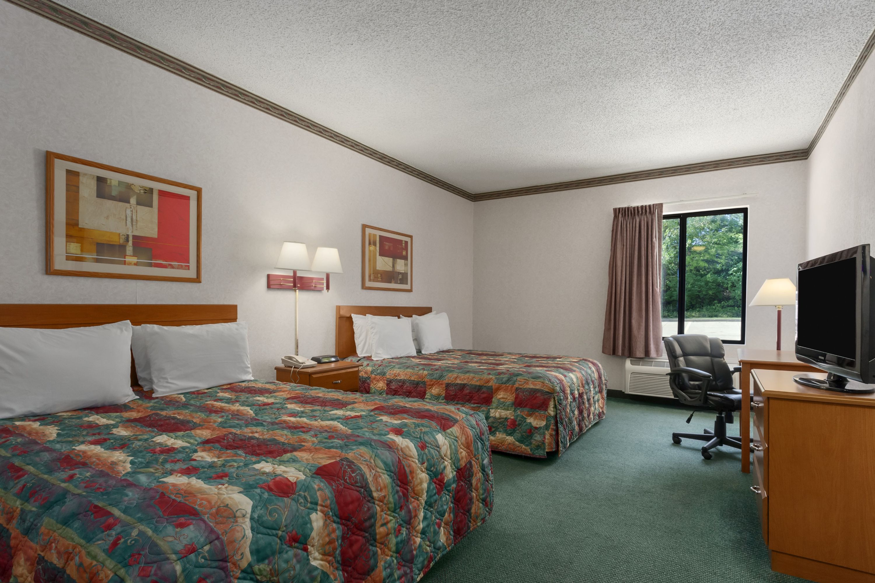 Guest room at the Days Inn by Wyndham Jefferson City in Jefferson City, Missouri